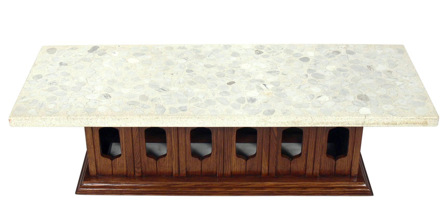 Modern terrazzo and walnut coffee table, designed by Harvey Probber, American, circa 1960s.