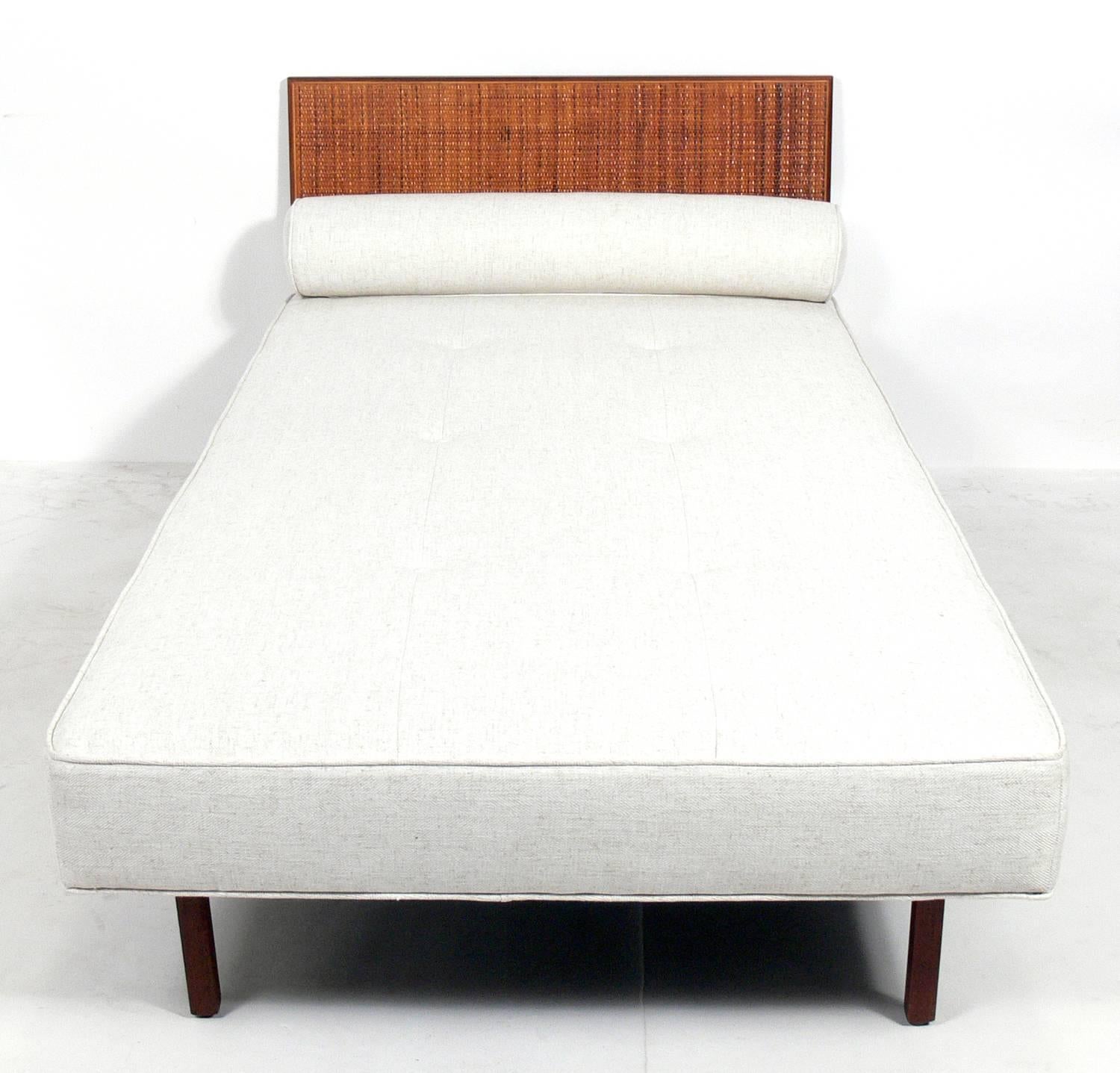 Clean Lined Daybed, designed by Florence Knoll for Knoll, American, circa 1950s. It has been reupholstered in an ivory color herringbone fabric.