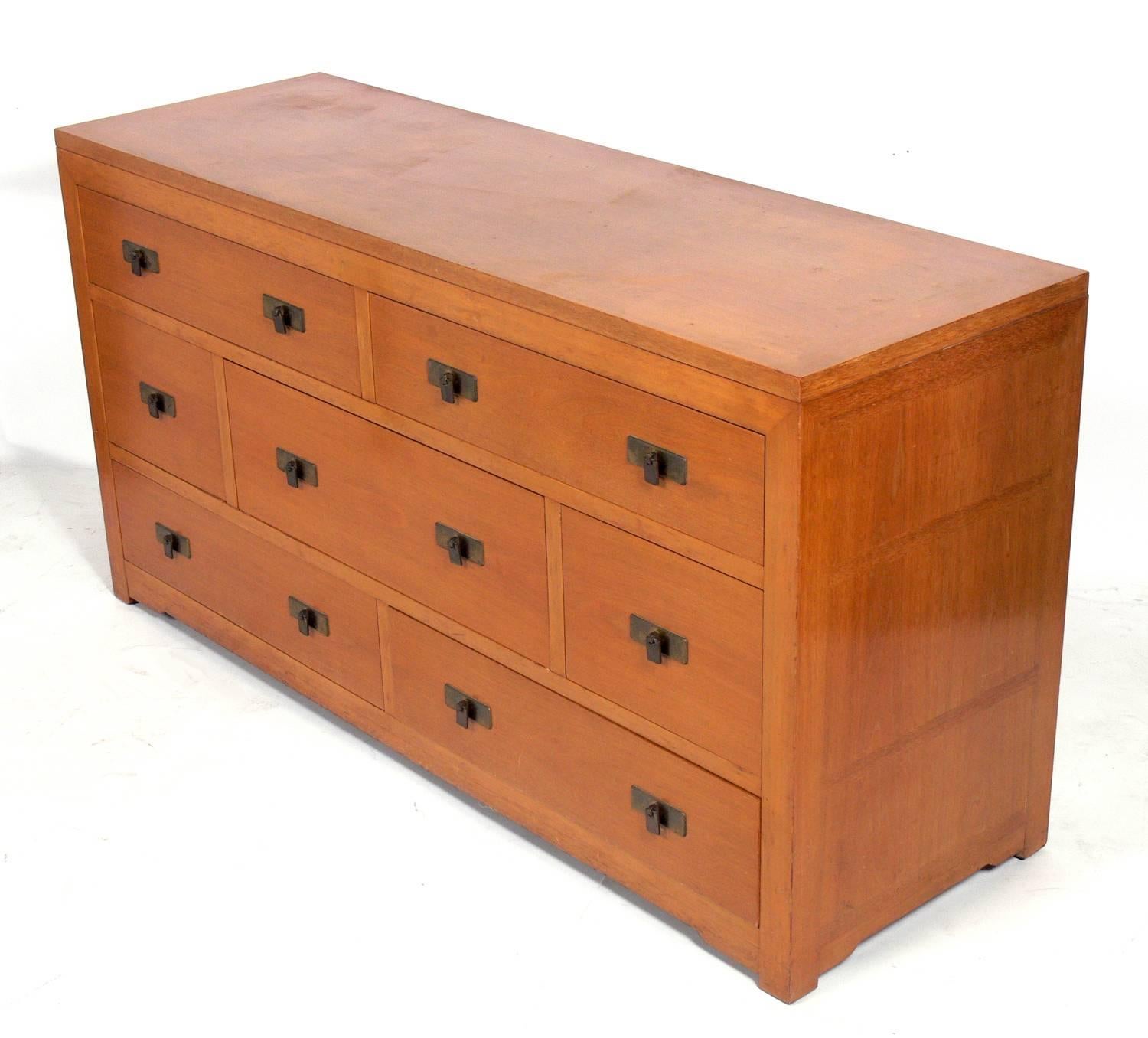 Clean lined Asian inspired chest or dresser, in the manner of Dunbar, American, circa 1950s. This chest is currently being refinished and can be completed in your choice of color. The price noted below includes refinishing in your choice of color.