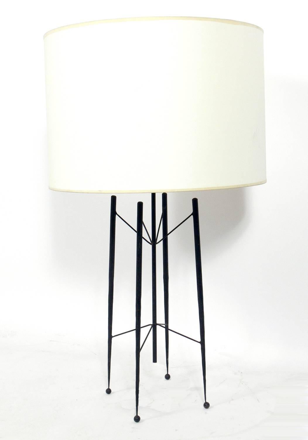 Sculptural California Modern iron lamp and candelabra, designed by Tony Paul for Woodlin-Hall, American, circa 1950s. We have never seen this lamp offered for sale before. It came out of the same estate as the candelabra. The lamp measures 33.5