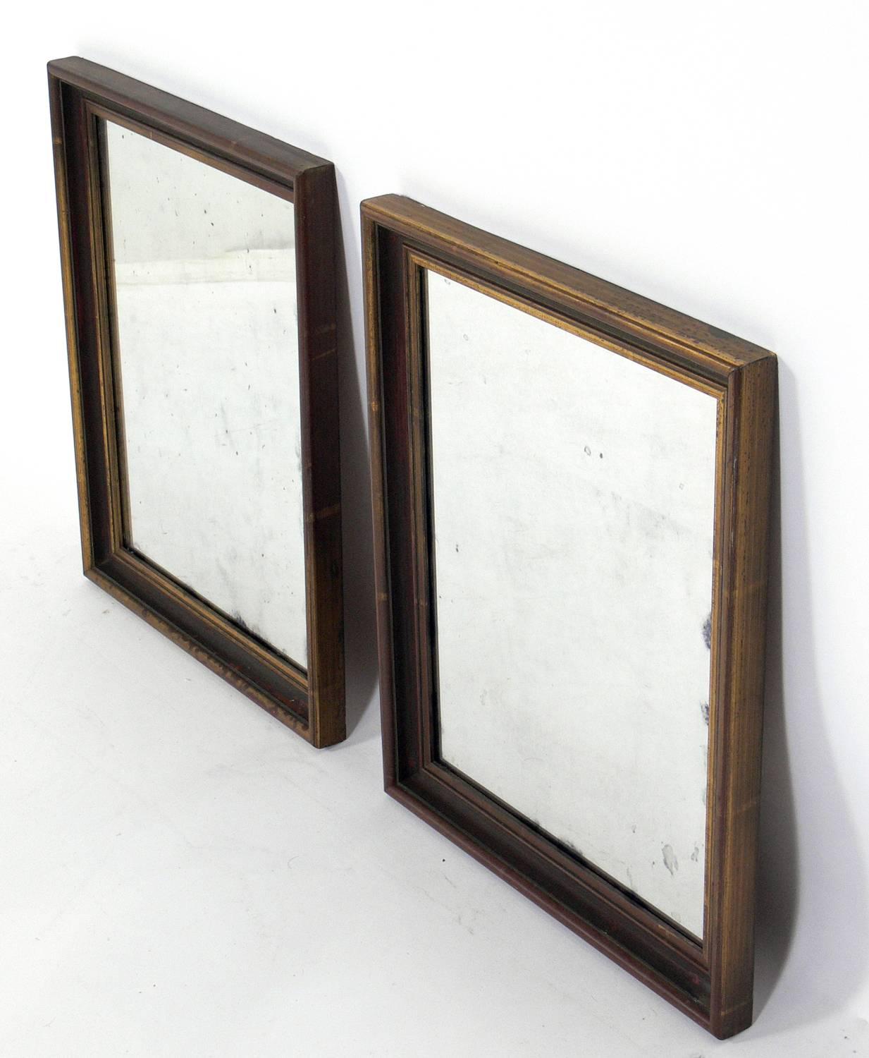 Pair of petite giltwood antiqued mirrors, American, circa 1940s.