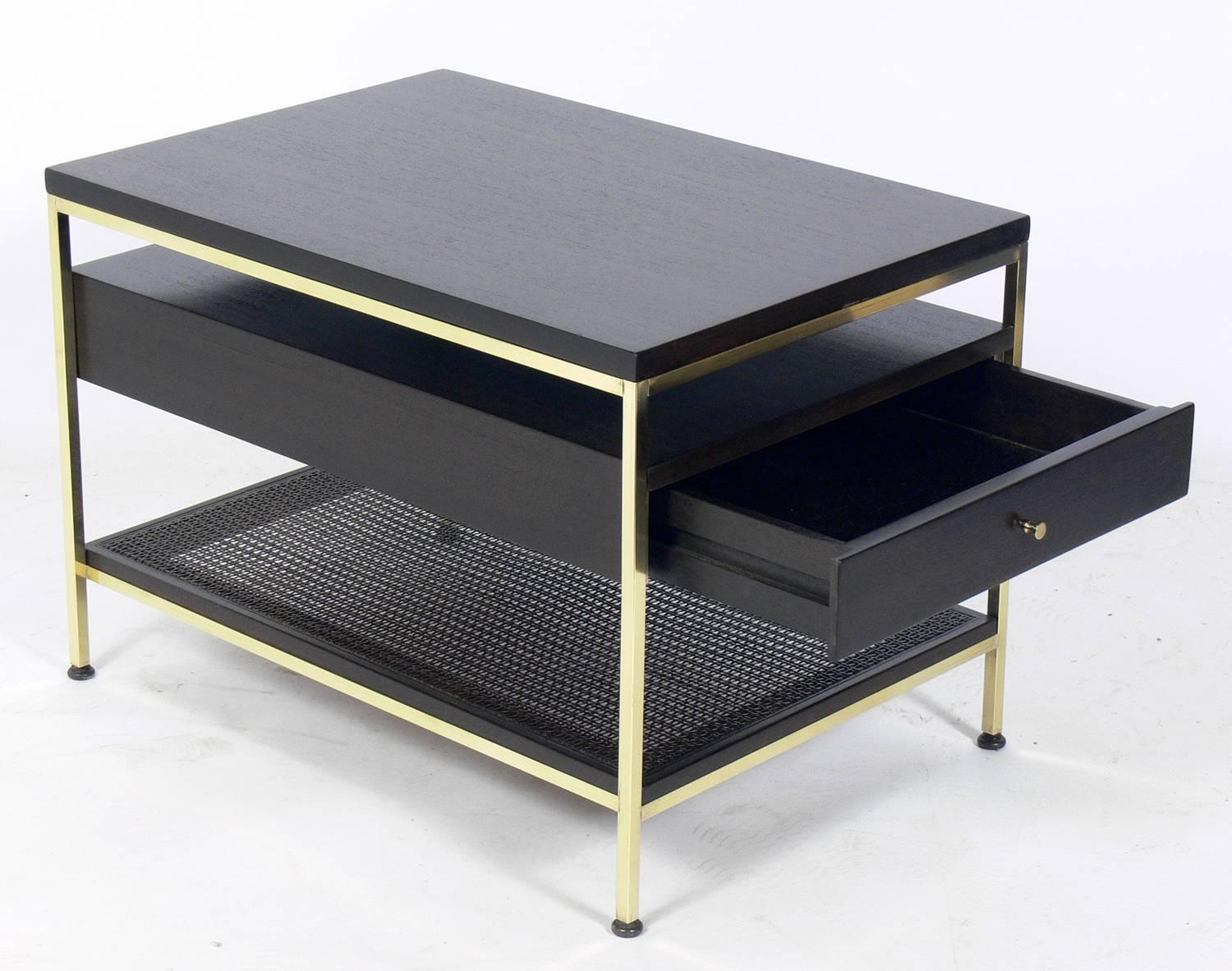 Modernist nightstand or side table, designed by Paul McCobb for Calvin, circa 1950s. This piece is a versatile size and can be used as a nightstand or side table. It has been completely restored in an ultra-deep brown color lacquer finish and the