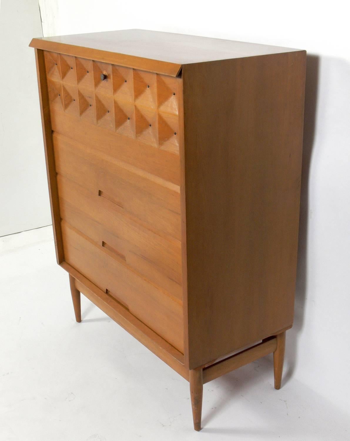 Tall Mid-Century cabinet, designed by Salvatore Bevelacqua, American, circa 1950s. This piece is a versatile size and can be used as a chest or dresser in a bedroom, or as storage in a living area.