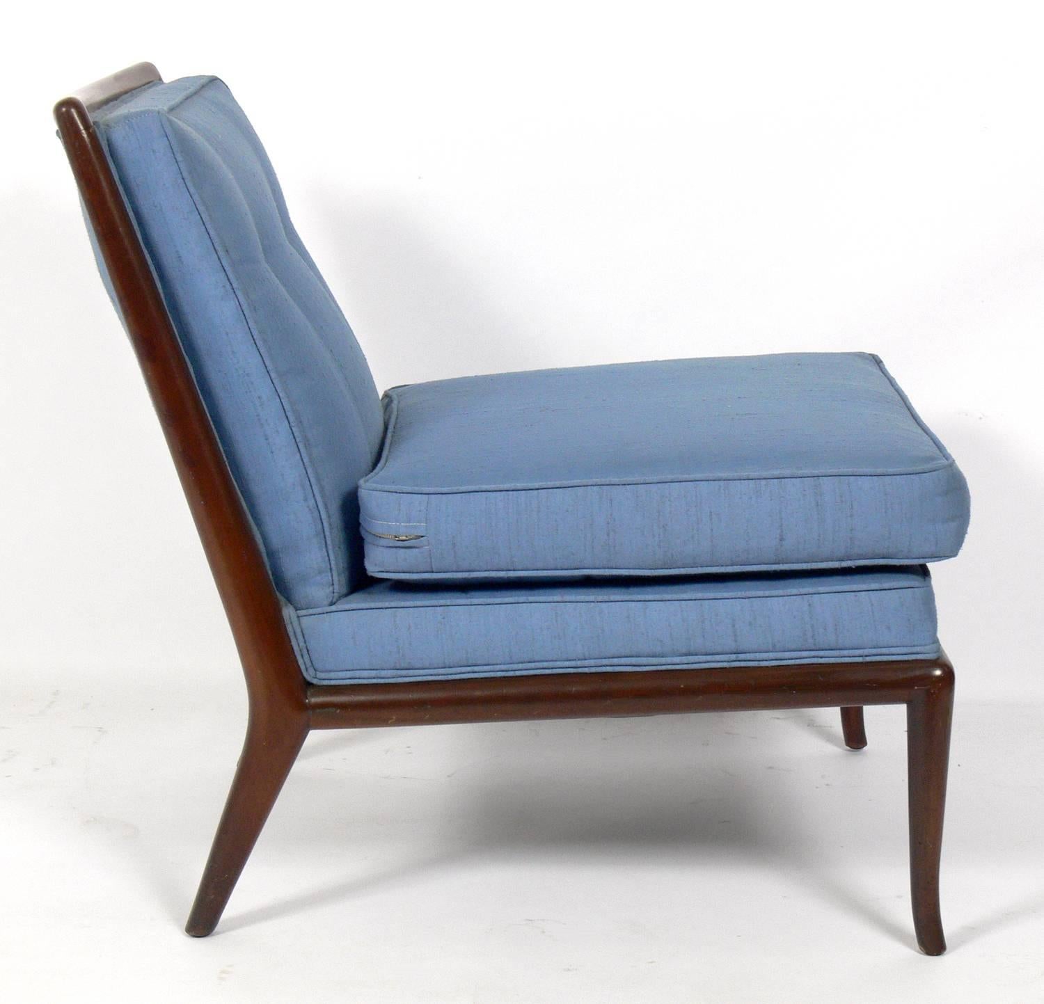Modernist slipper chair, designed by T.H. Robsjohn-Gibbings for Widdicomb, circa 1950s. As with all of Gibbings' designs, this chair has elegant, clean lines that look good from any angle. This chair is currently being refinished and reupholstered