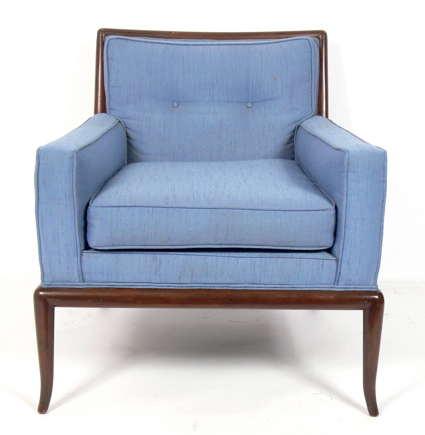 Pair of elegant lounge chairs, designed by T.H. Robsjohn Gibbings for Widdicomb, American, circa 1950s. These chairs are currently being refinished and reupholstered and can be completed in your choice of finish color and reupholstered in your