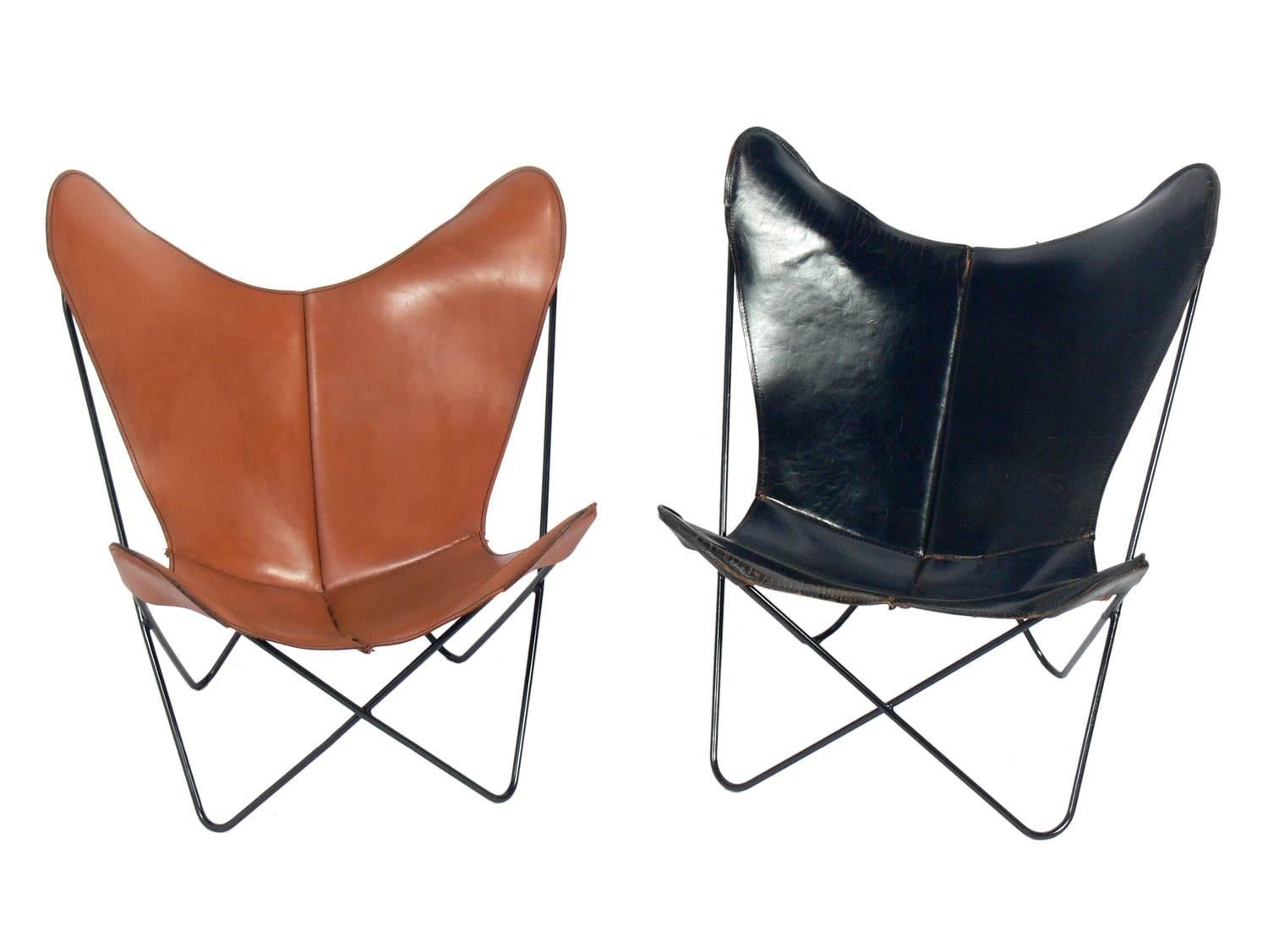Sculptural leather Butterfly chairs designed by Jorge Ferrari-Hardoy, American, circa 1960s. The chair pictured on the left measures 35