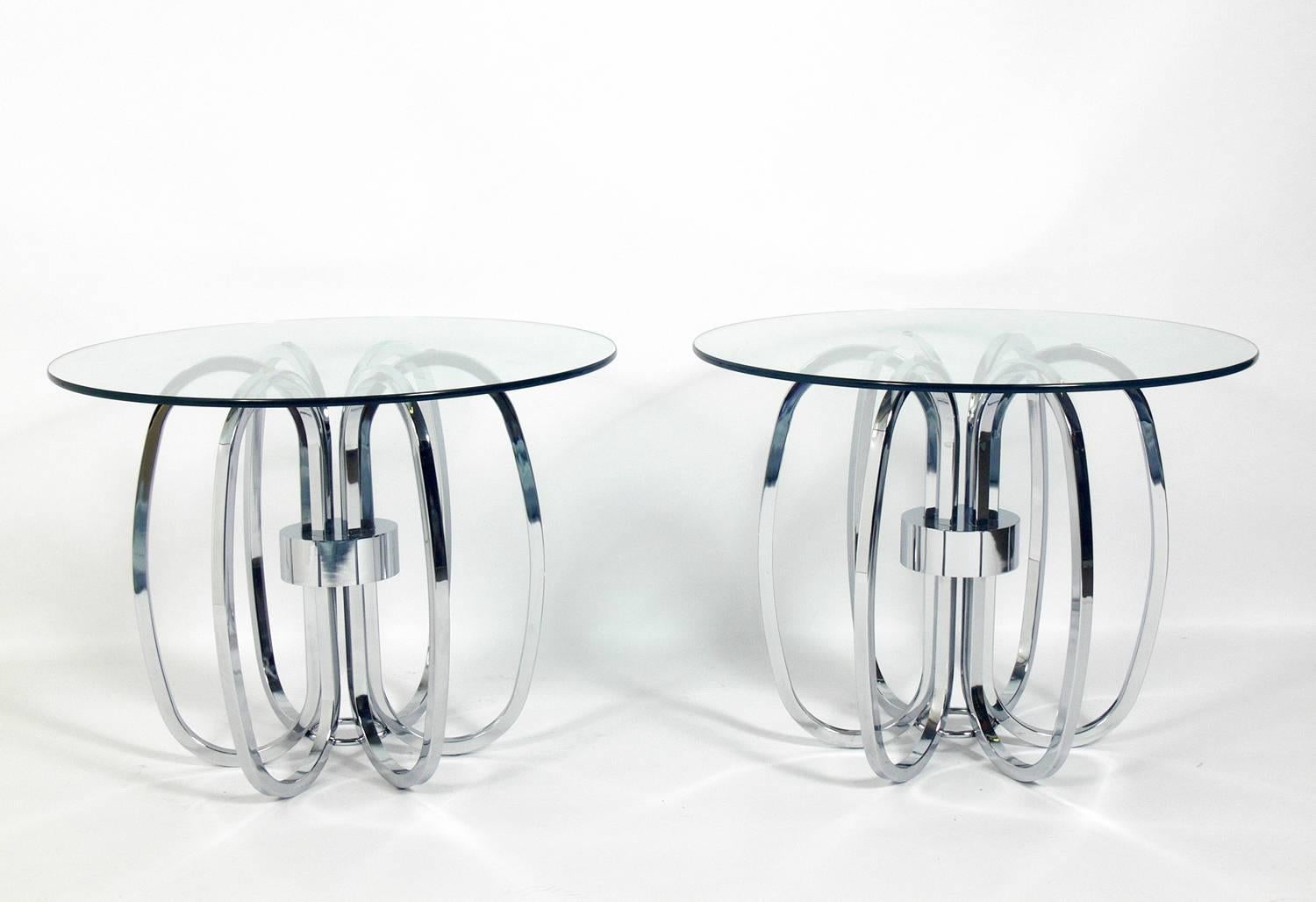 Pair of sculptural chrome-plated metal side tables, American, circa 1960s. They are a versatile size and can be used as end or side tables, or as nightstands.