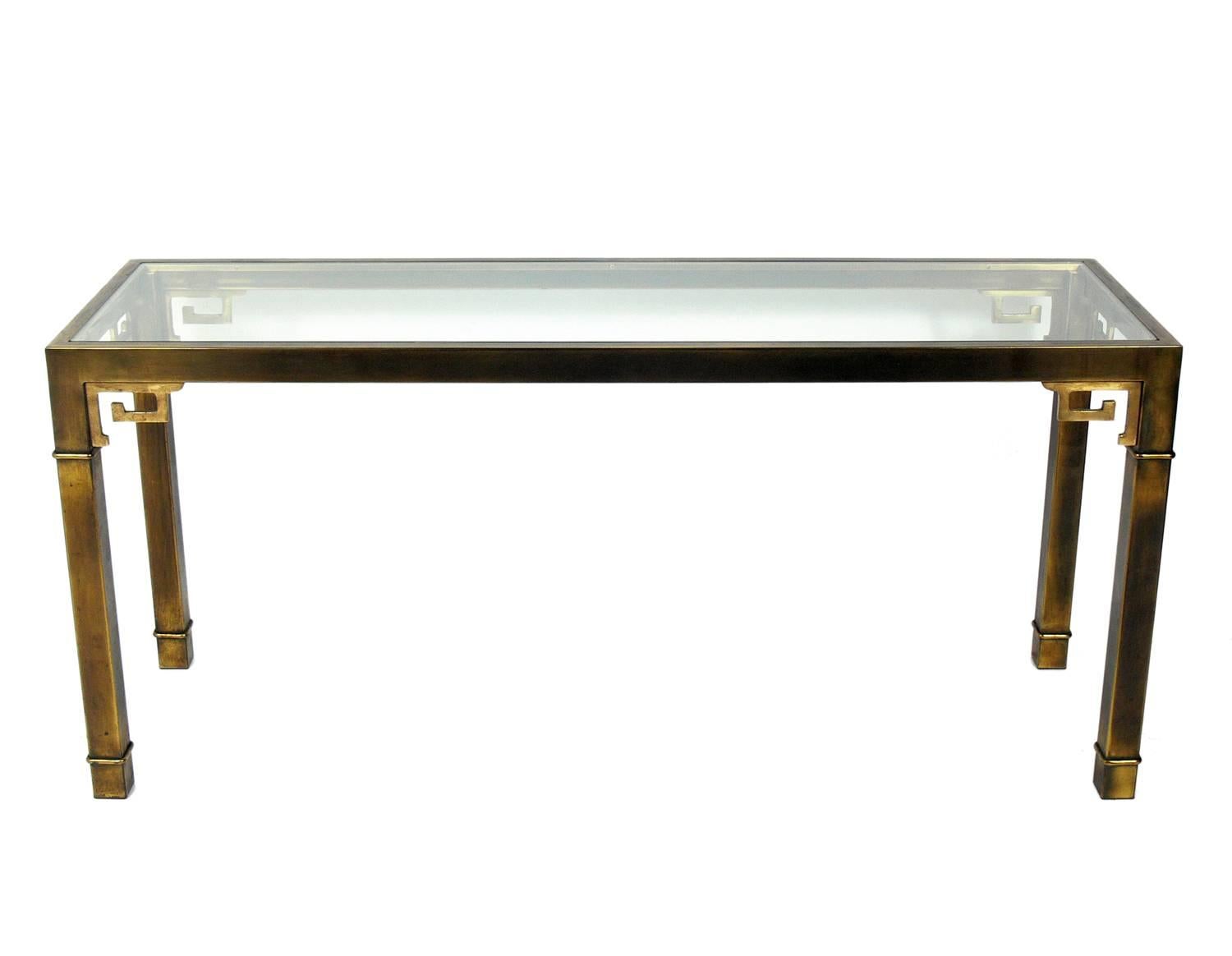 Asian Influenced brass console table by Mastercraft, American, circa 1960s. Retains warm original patina. This piece is a versatile size and can be used as a console table, desk, vanity, or bar.