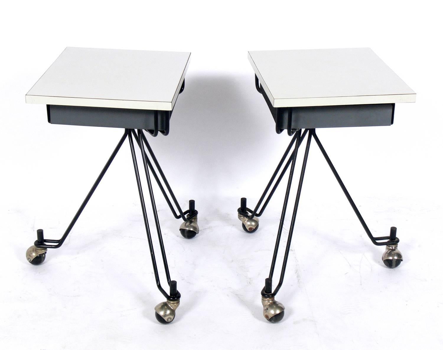 Pair of sculptural tables or nightstands, designed by Eliot Noyes for IBM, American, circa 1950s.