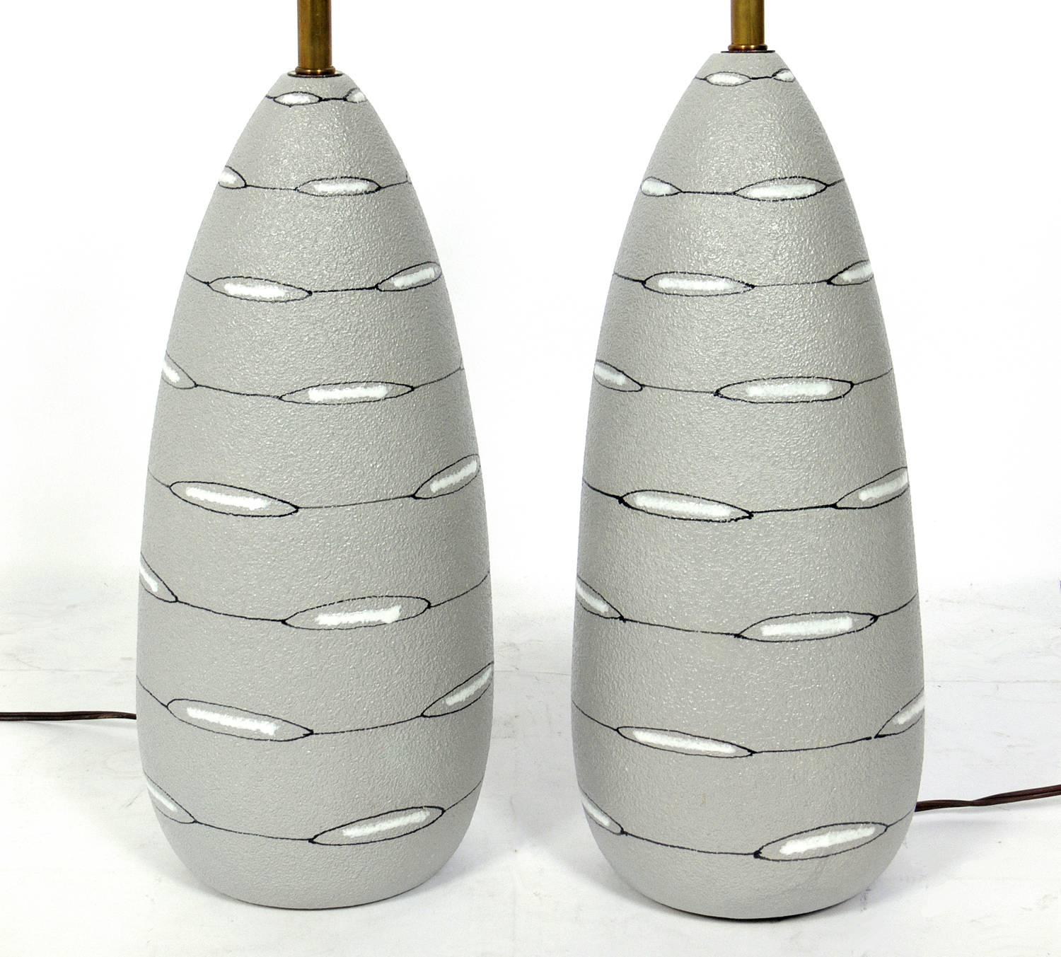 Pair of Italian Mid-Century ceramic lamps, imported for Raymor, Italian, circa 1950s.