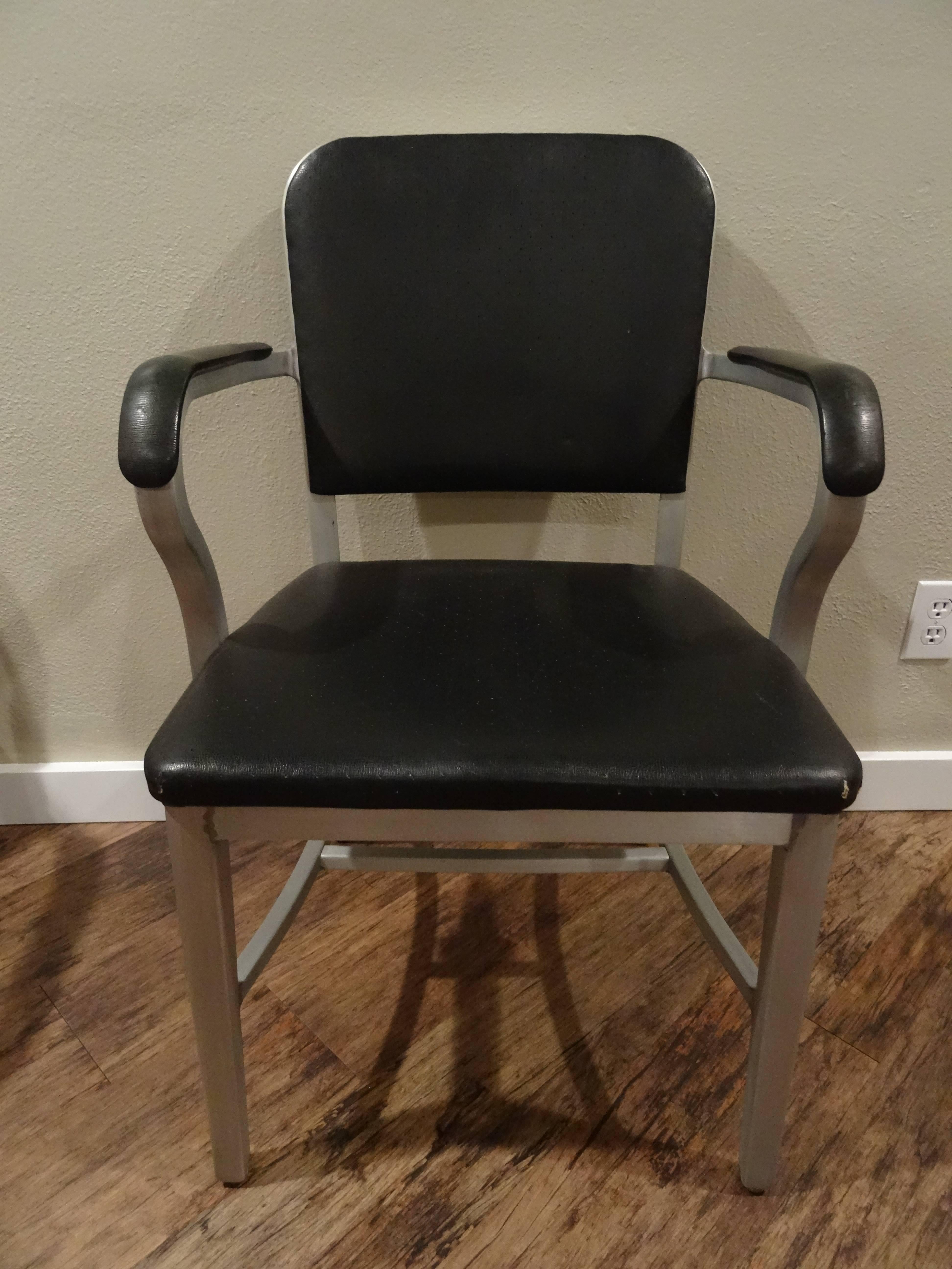 Mid century modern pair of Good Form Chairs, tagged general fireproofing company Aug. 1951.  Original paint has been stripped to show aluminum frames.  Original upholstery with minor wear reapplied to show it's life history.