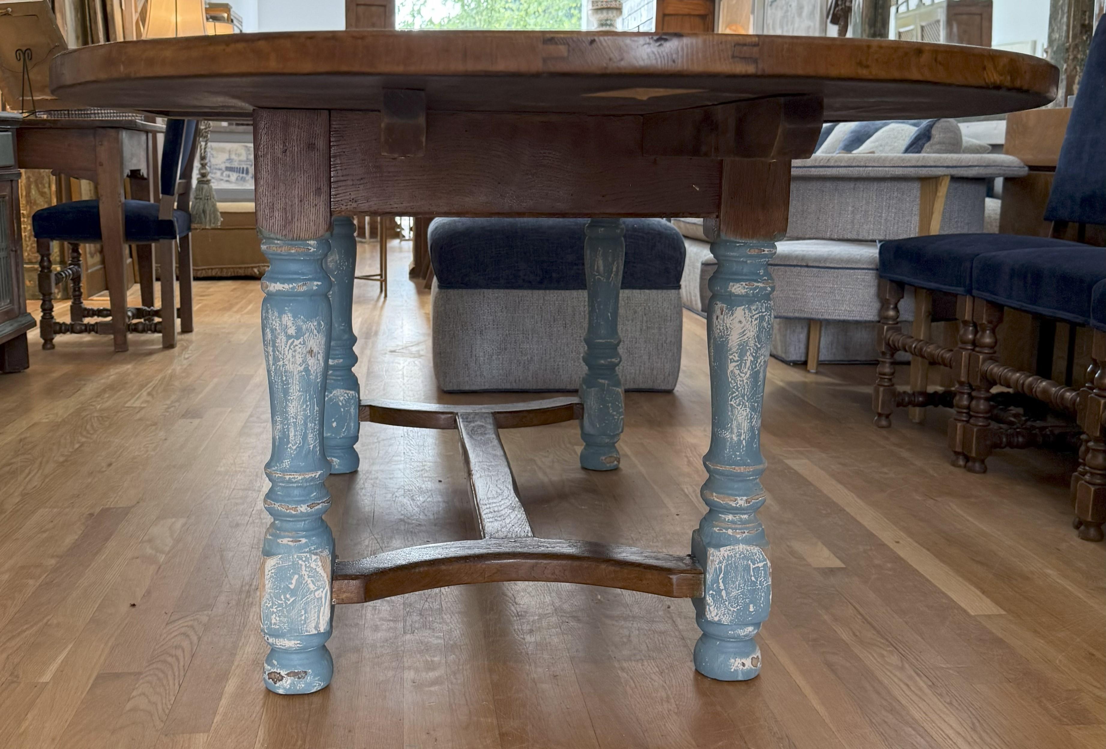 Carved 19th Century French Provincial Extending Oval Farm Table with Louis XIII Legs For Sale