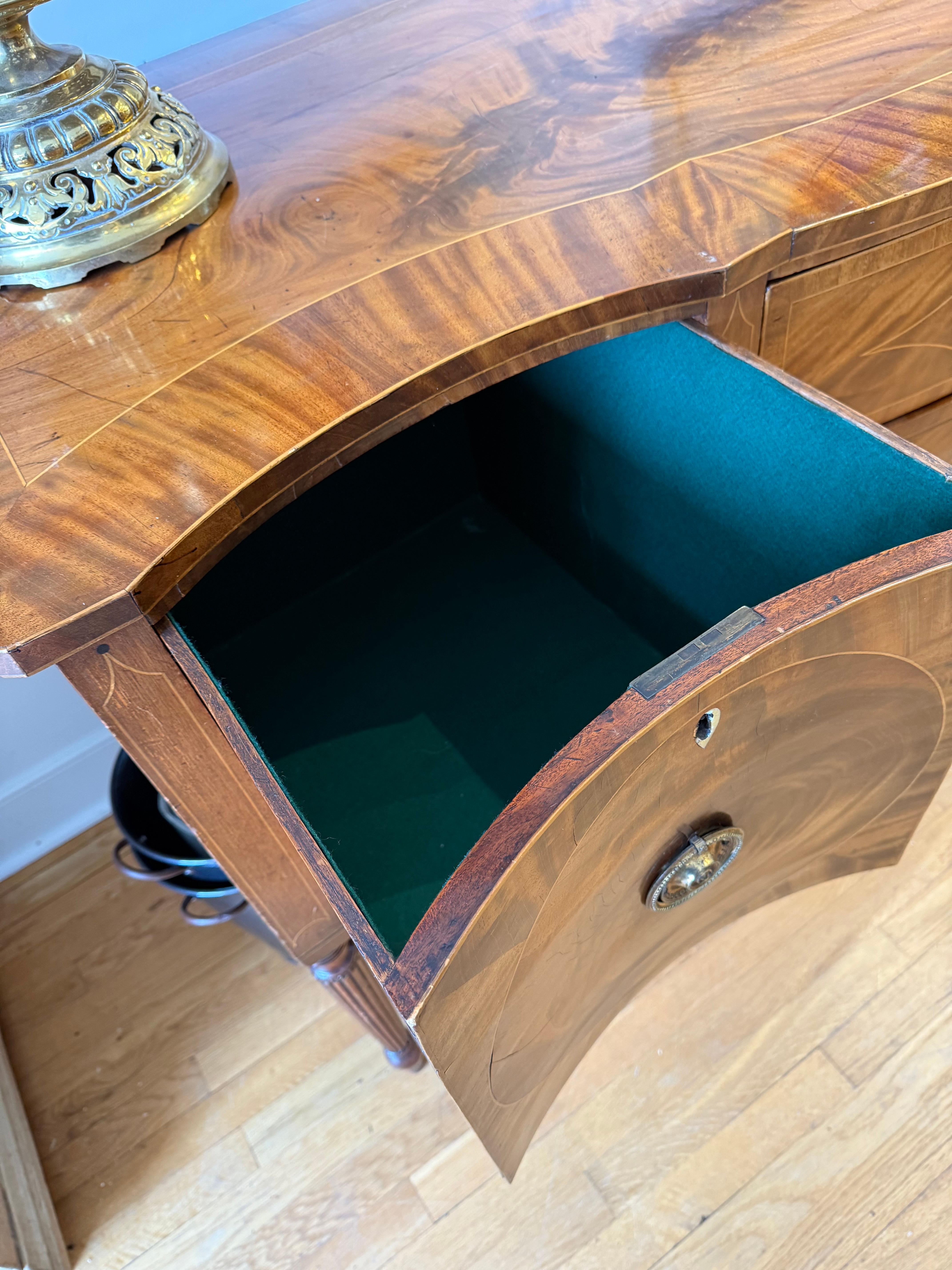 Metal Early Sheraton Period Flame Mahogany Serpentine Sideboard For Sale