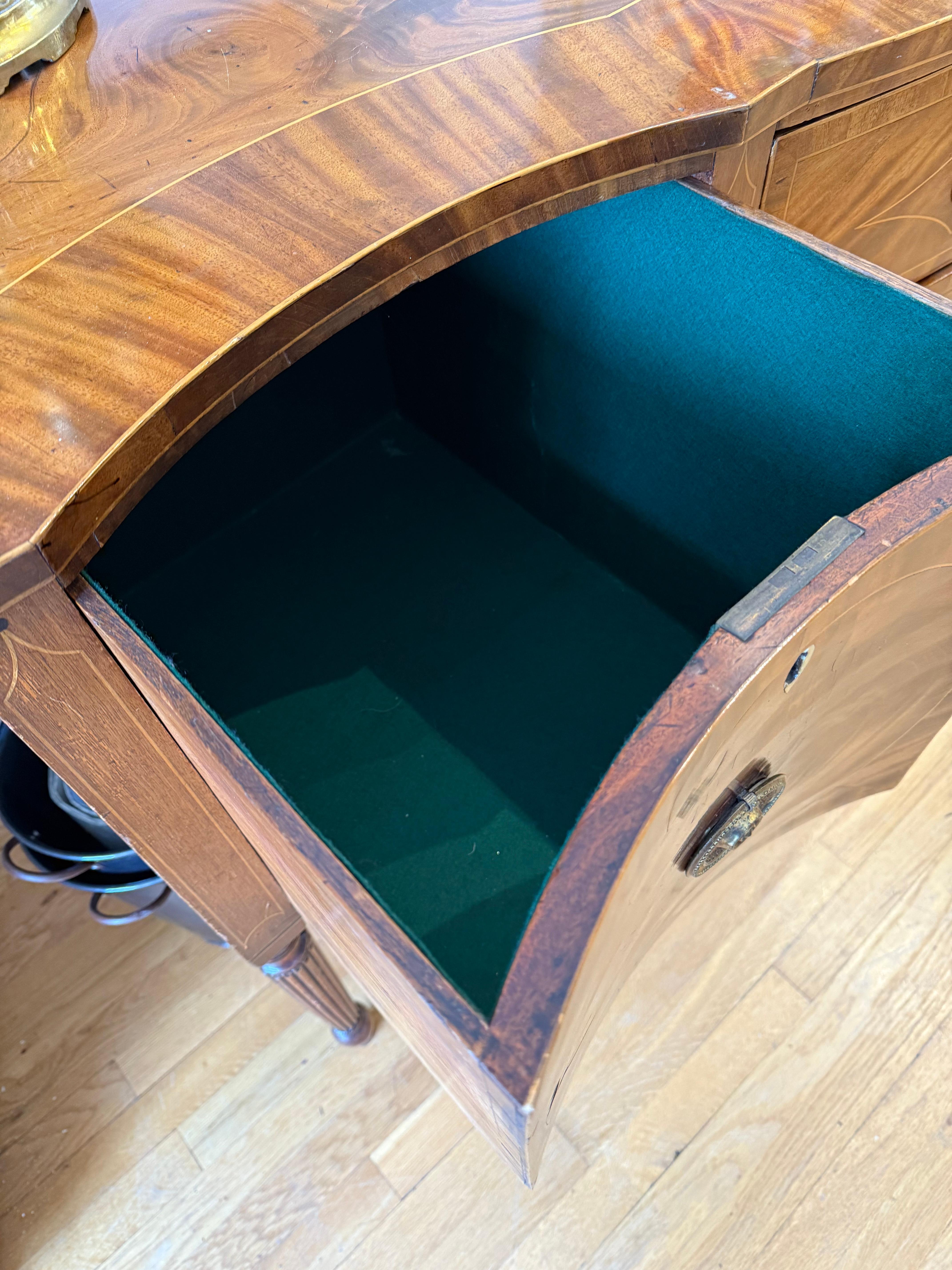 18th Century Early Sheraton Period Flame Mahogany Serpentine Sideboard For Sale