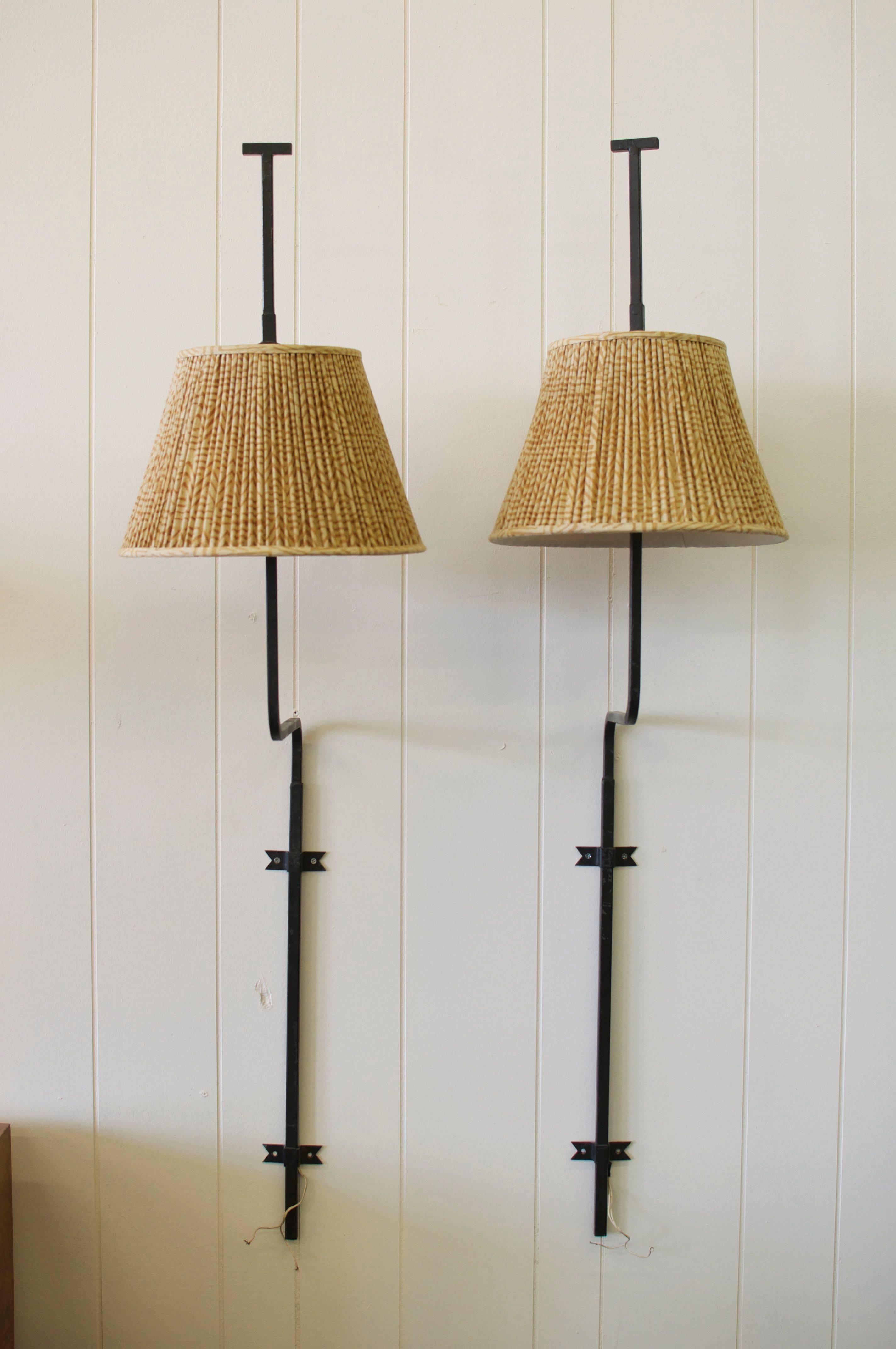Rare pair of Salterini wall sconces.