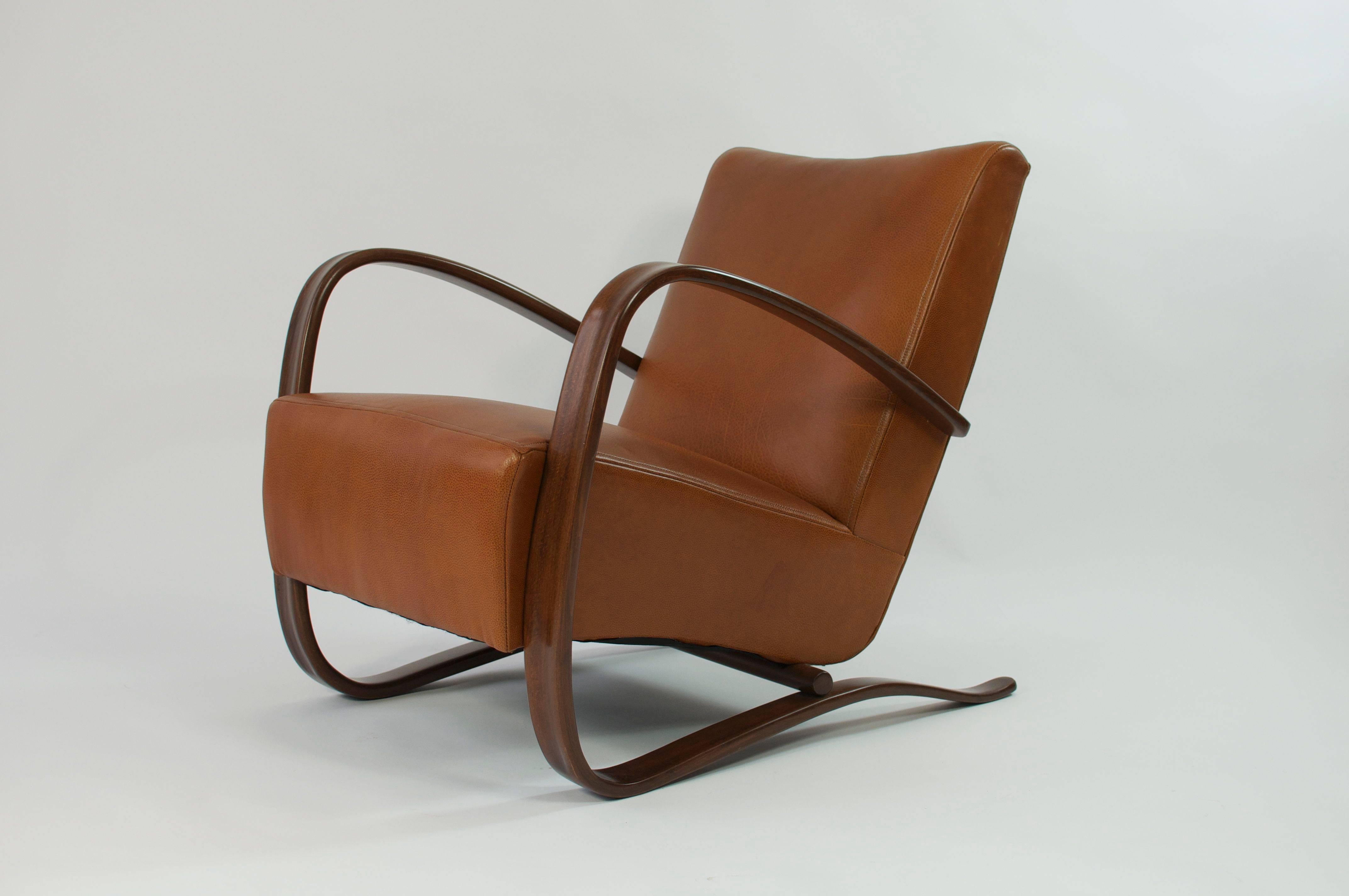 Pair of Jindrich Halabala lounge chairs. Recently refinished and re-upholstered in leather.