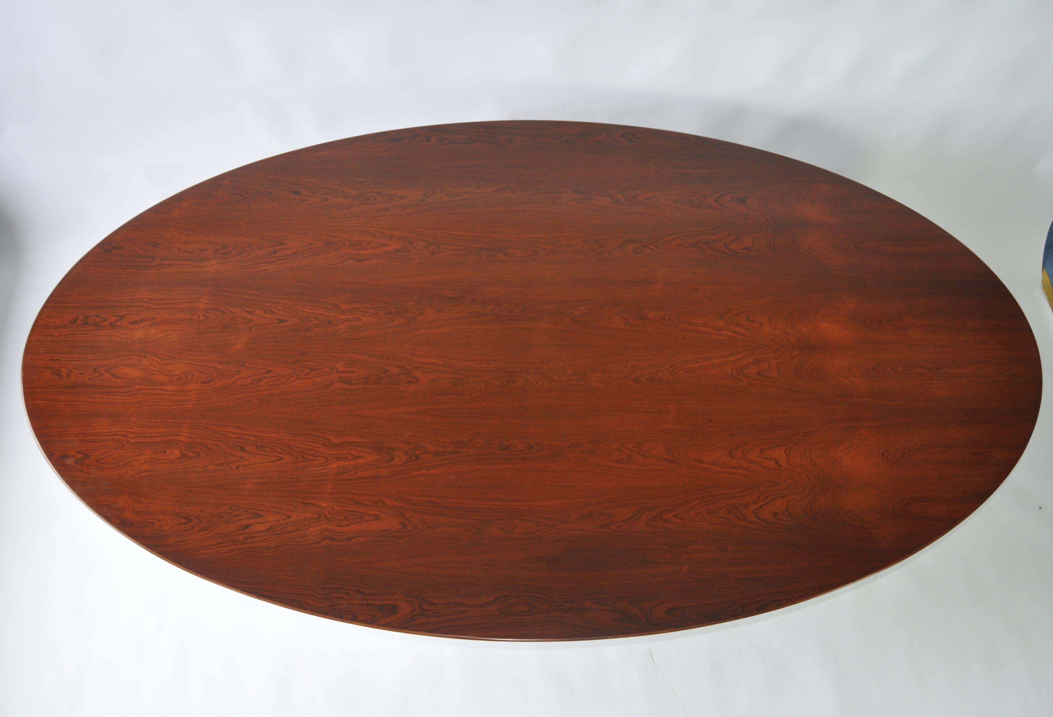 Early Eero Saarinen for Knoll oval rosewood dining table. This is the larger version.