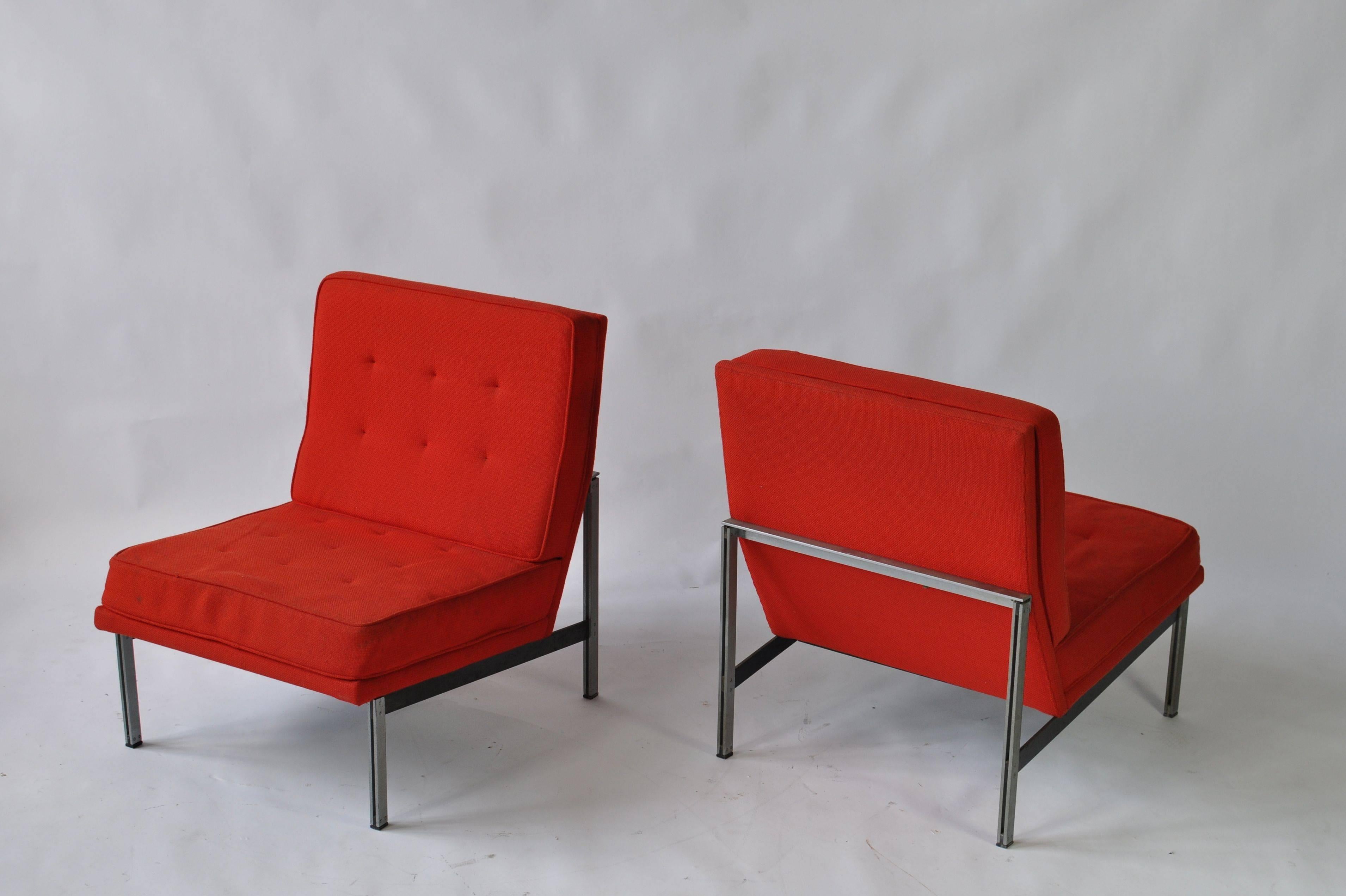 Pair of Florence Knoll parallel bar lounge chairs.