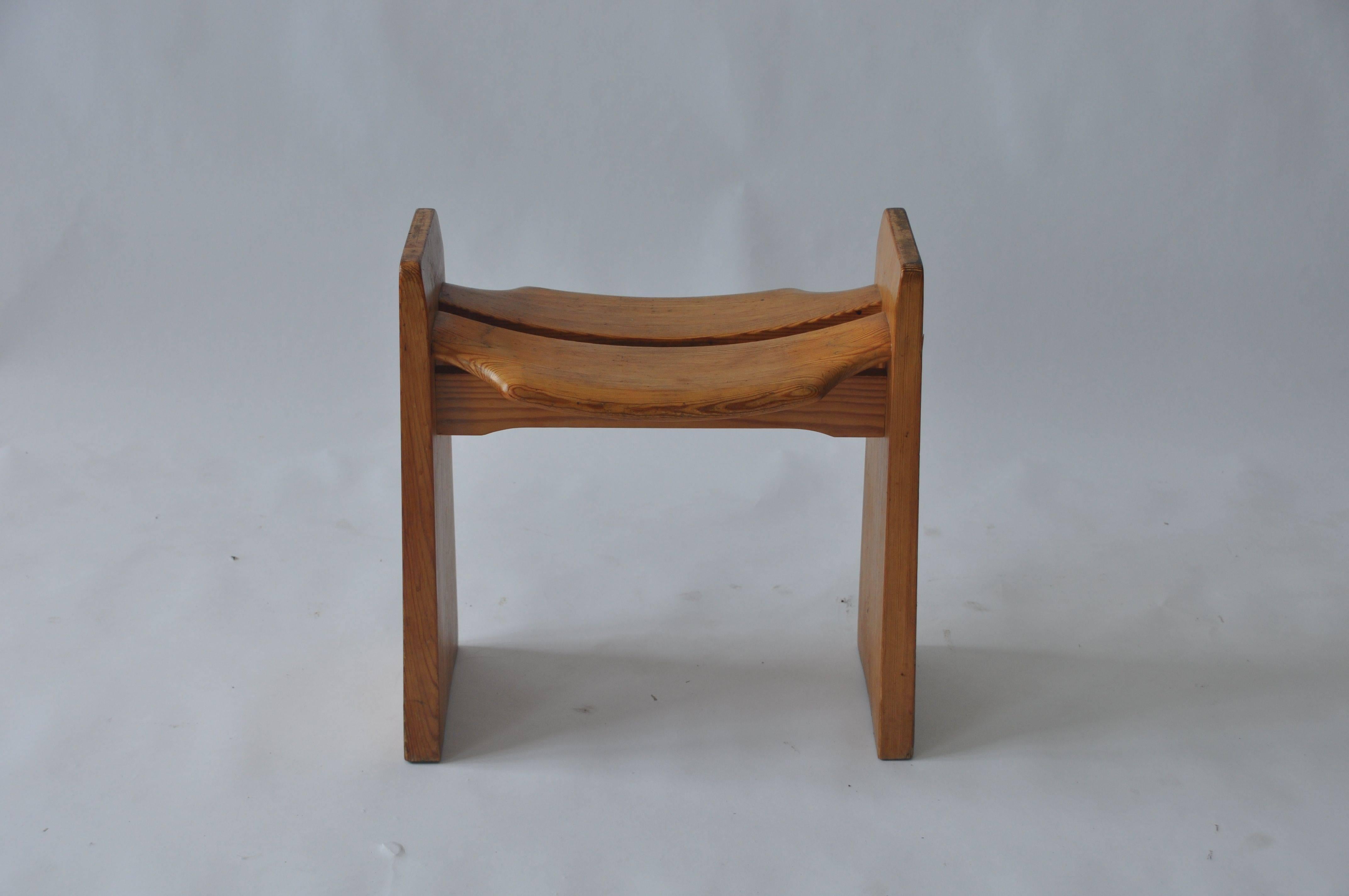 Solid pine stool by Gilbert Marklund, circa 1950s. Manufactured by Furusnickarn AB. Made in Sweden.