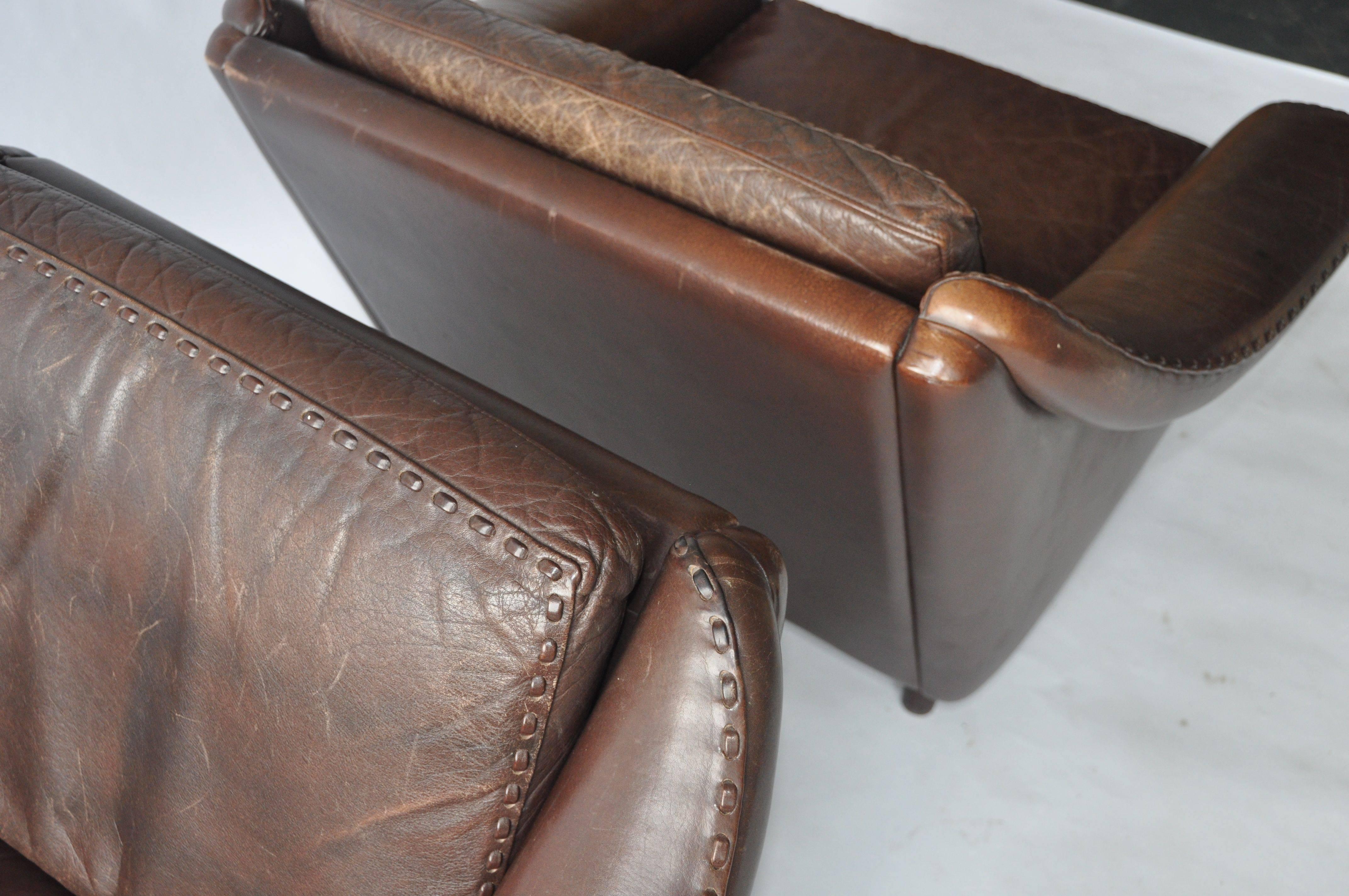 Stained Pair of Aage Christiansen Danish Leather Lounge Chairs