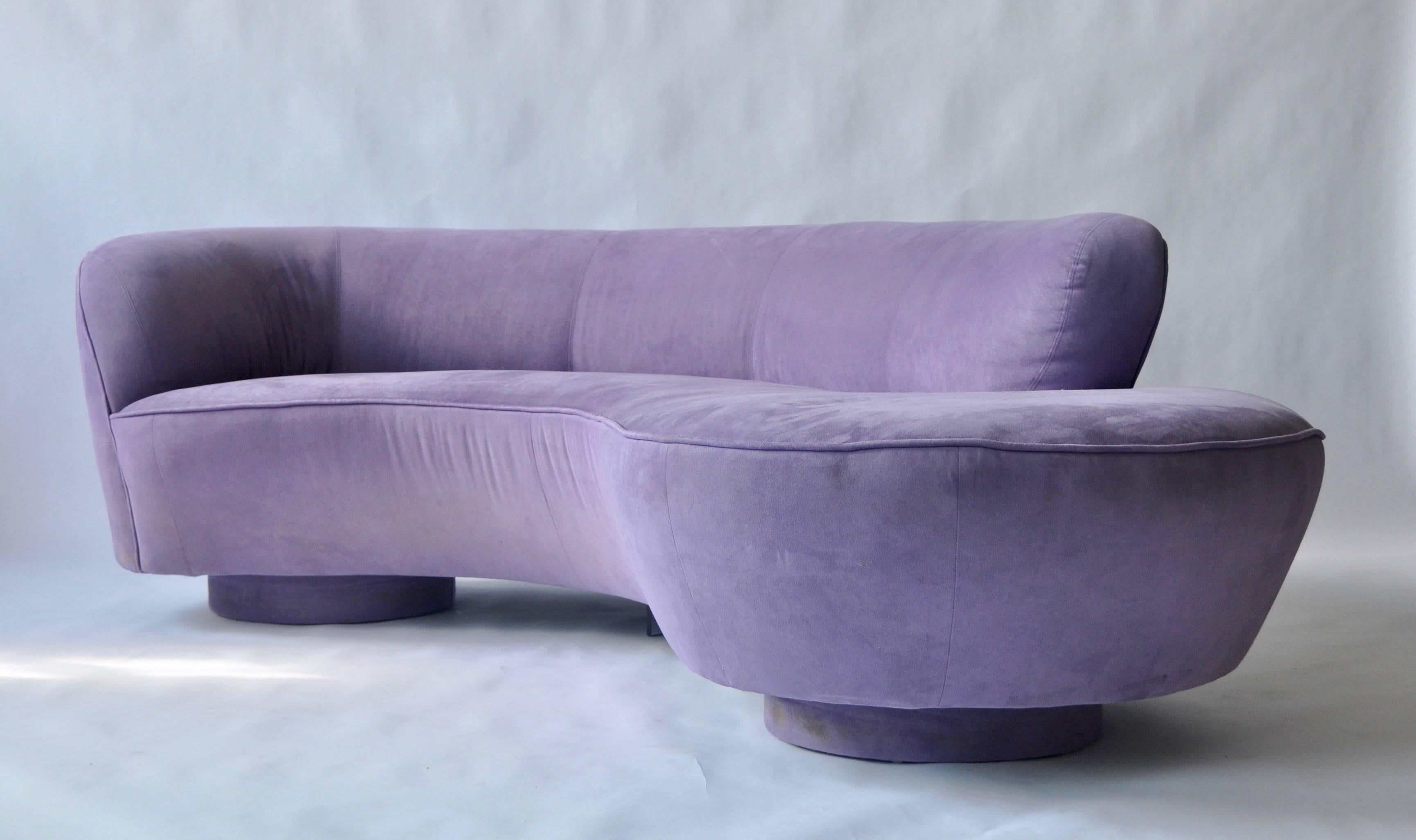 Vladimir Kagan Sofa for Directional. Sofa sits on two upholstered circle bases and one Lucite support. Singed with Directional label.