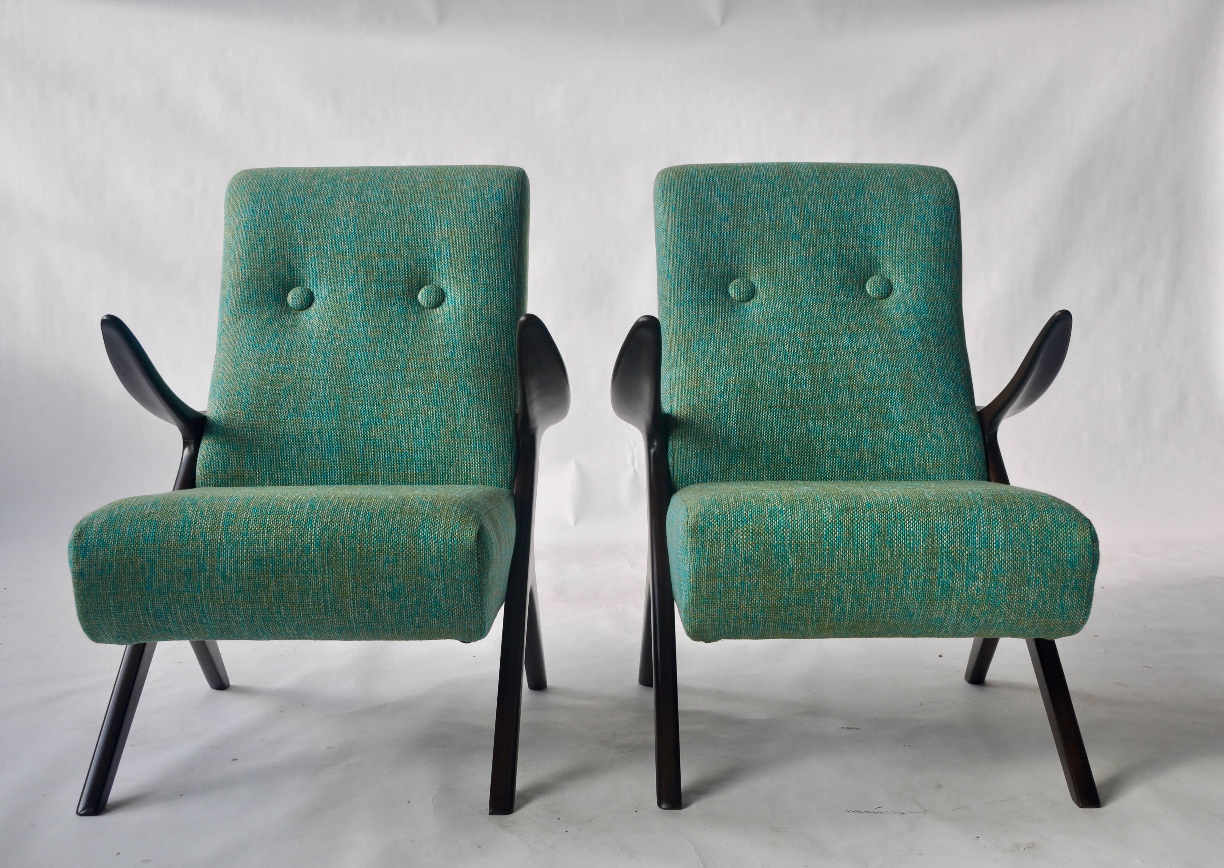 Pair of sculptural Danish lounge chairs.