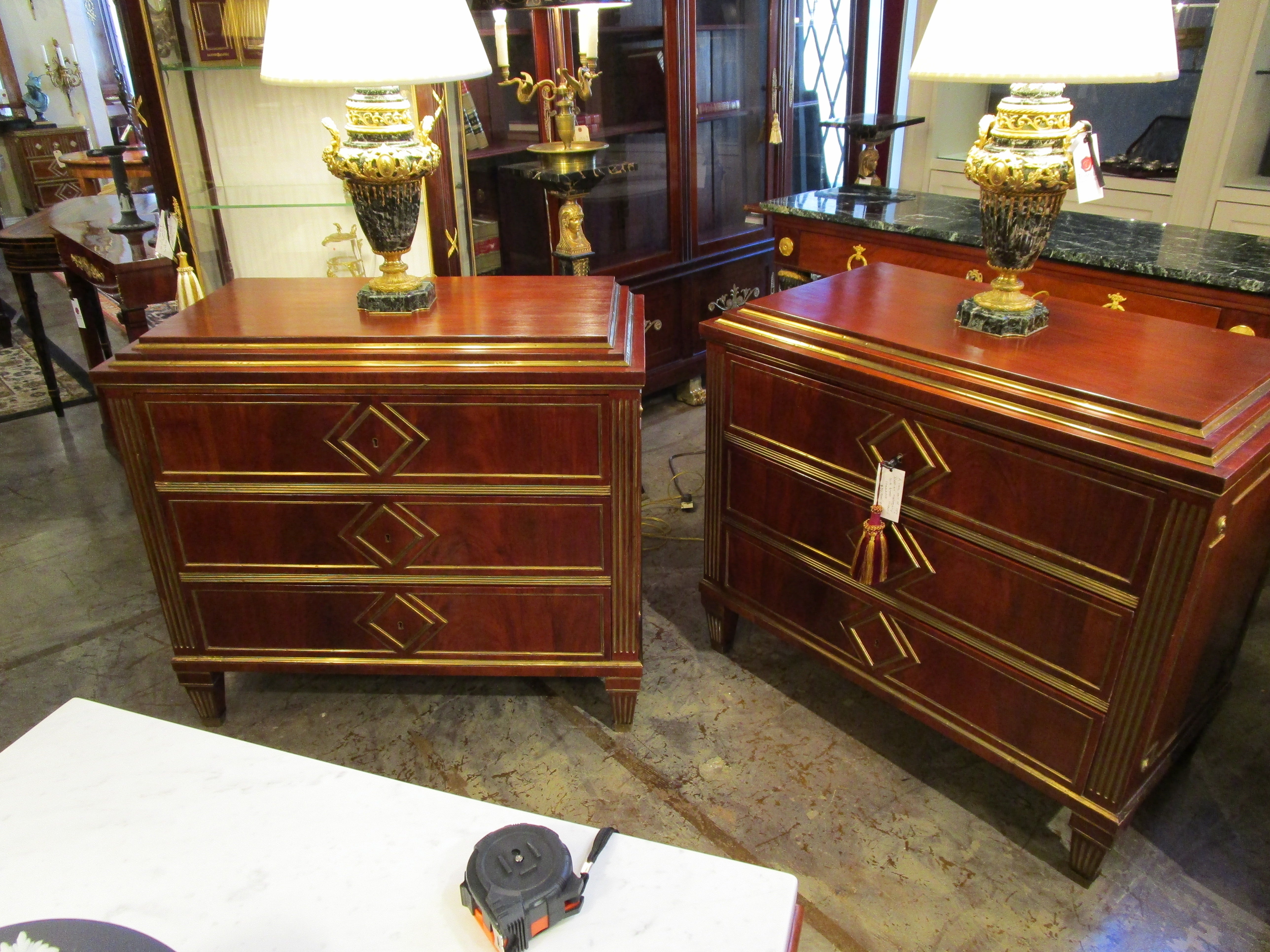 A fine pair of Russian 19th century mahogany and brass inlayed  commodes.