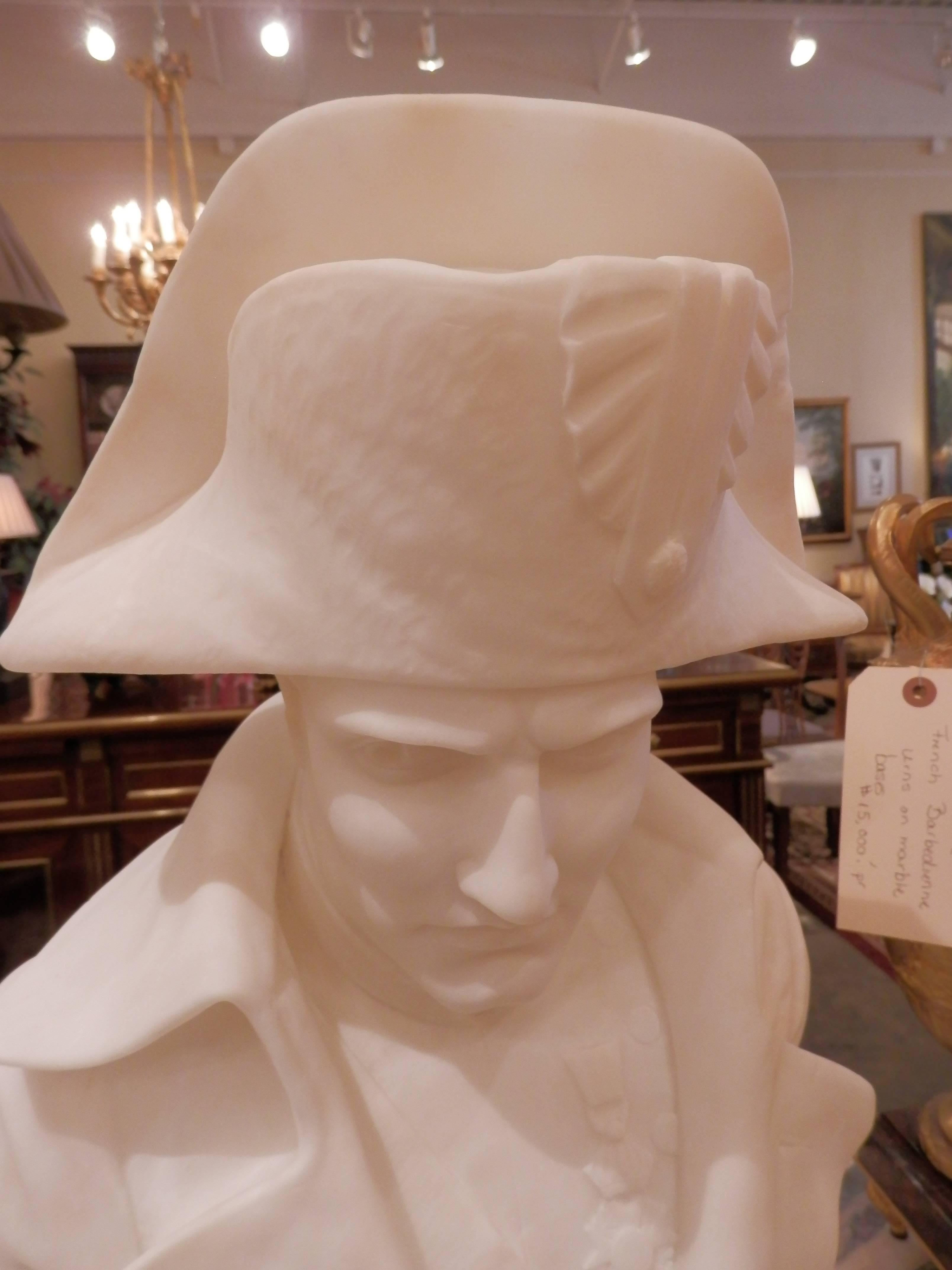 19th century French Carrara marble signed bust of Napoleon.

Napoleon in bicorne hat and wearing Honor of Legions medal on his chest.

Black marble base.