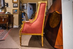 A fine pair of 19th century Italian Louis XVI gilded armchairs