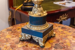 A fine 19th century Charles X column gilt bronze and patinated bronze lamp
