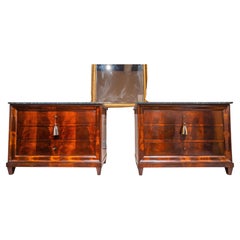 A fine pair of Louis Philippe mahogany and marble top commodes. Original keys