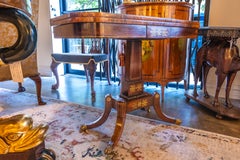 A fine 19th century Regency rosewood and brass inlayed gaming table