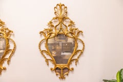 A good pair of carved early 20th century Georgian style gilt mirrors