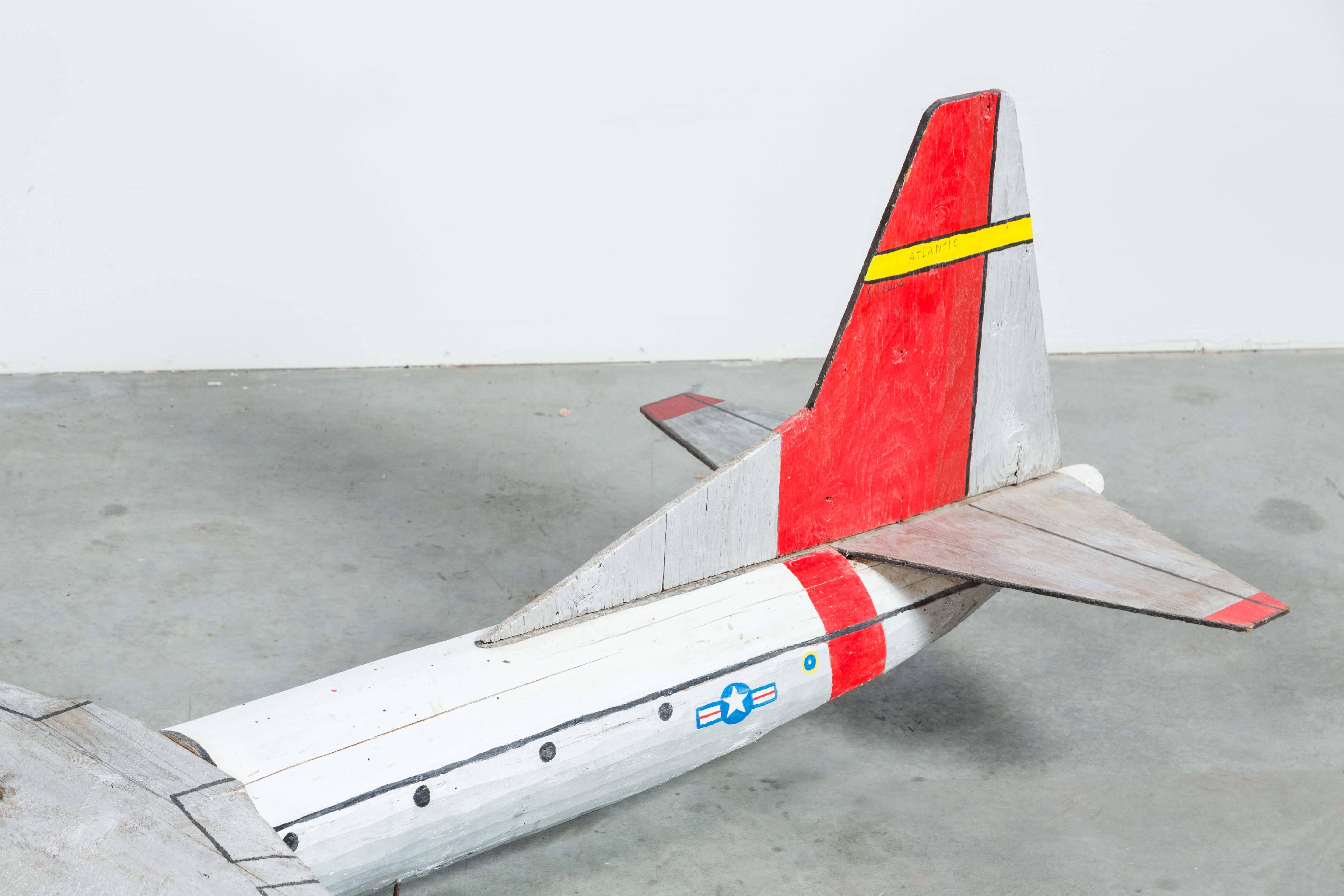 Folk Art Mid-Century American Large Scale Wood Carved C-133A Plane For Sale