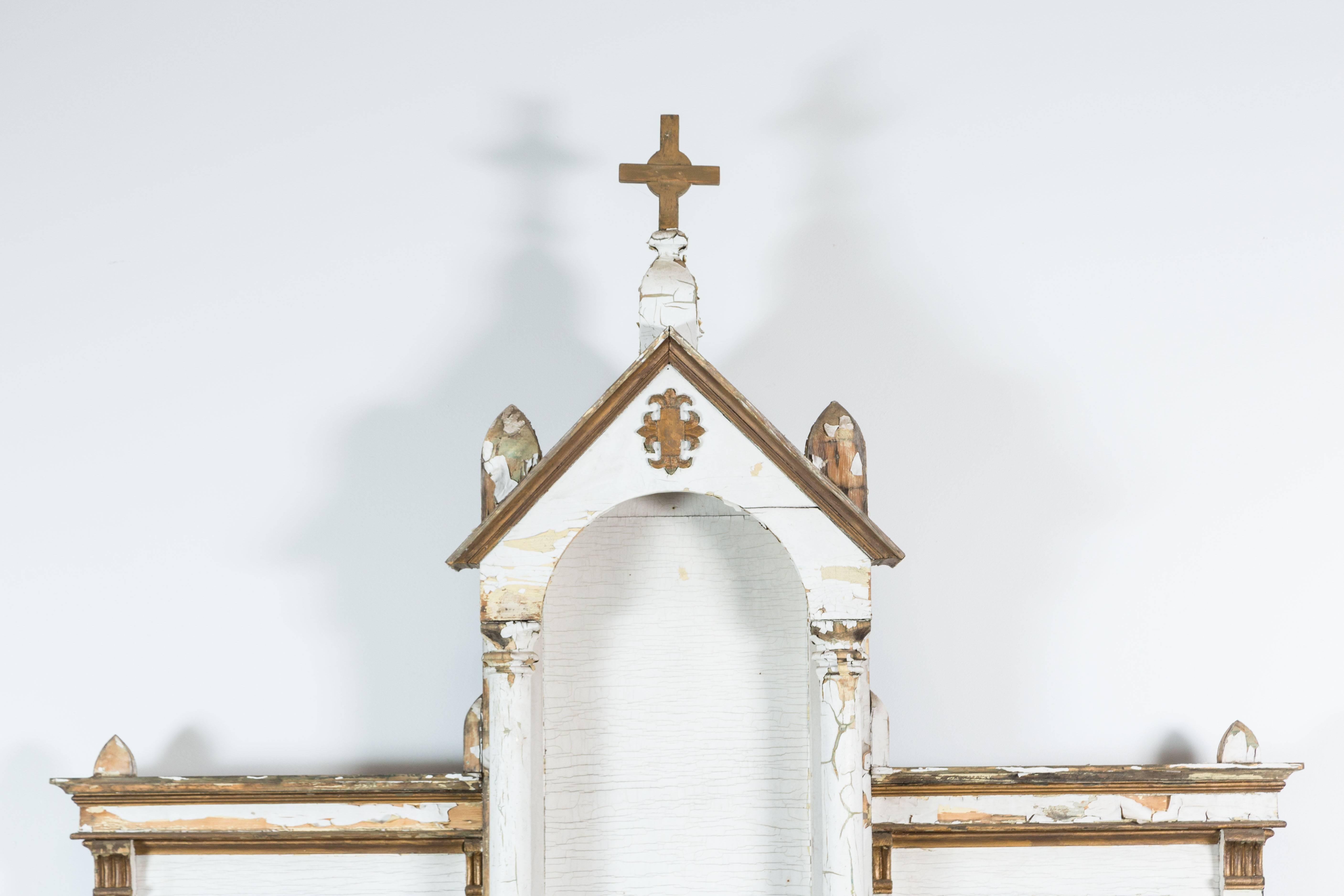 Large-scale North American church altar found in the midwestern United States. Most likely Canadian made. Traces of original white and gold paint surface. Chalice lock box with original key. Marble in front that appears to be wine stained from many