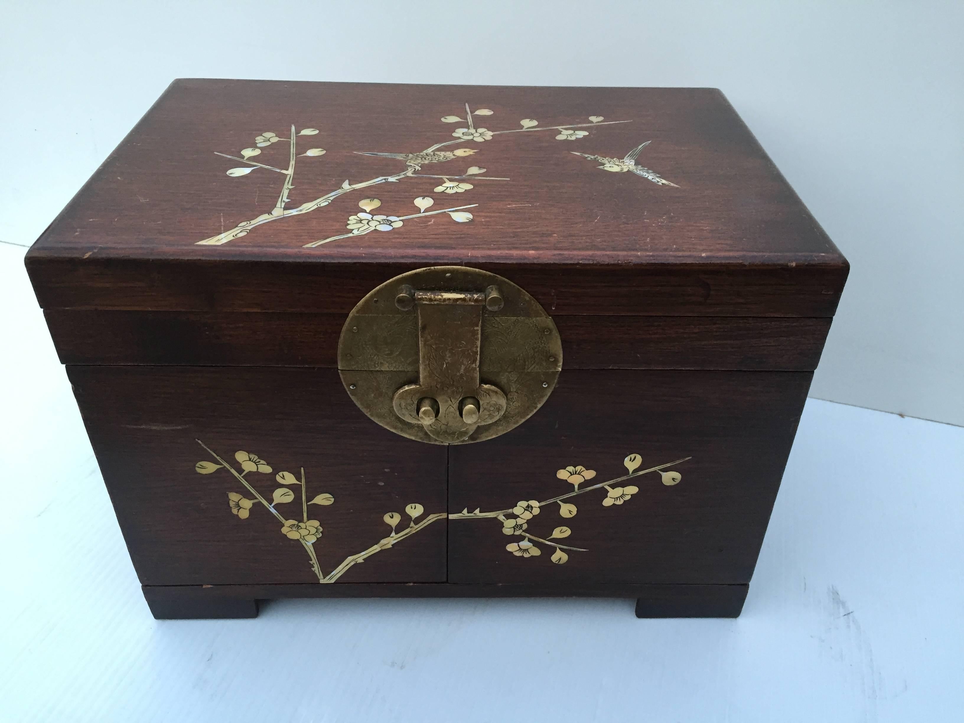 Beautiful jewelry box with inlaid mother-of-pearl motif and elegant Asian hardware, makes for an excellent gift for the holiday season, can be touched up upon request.