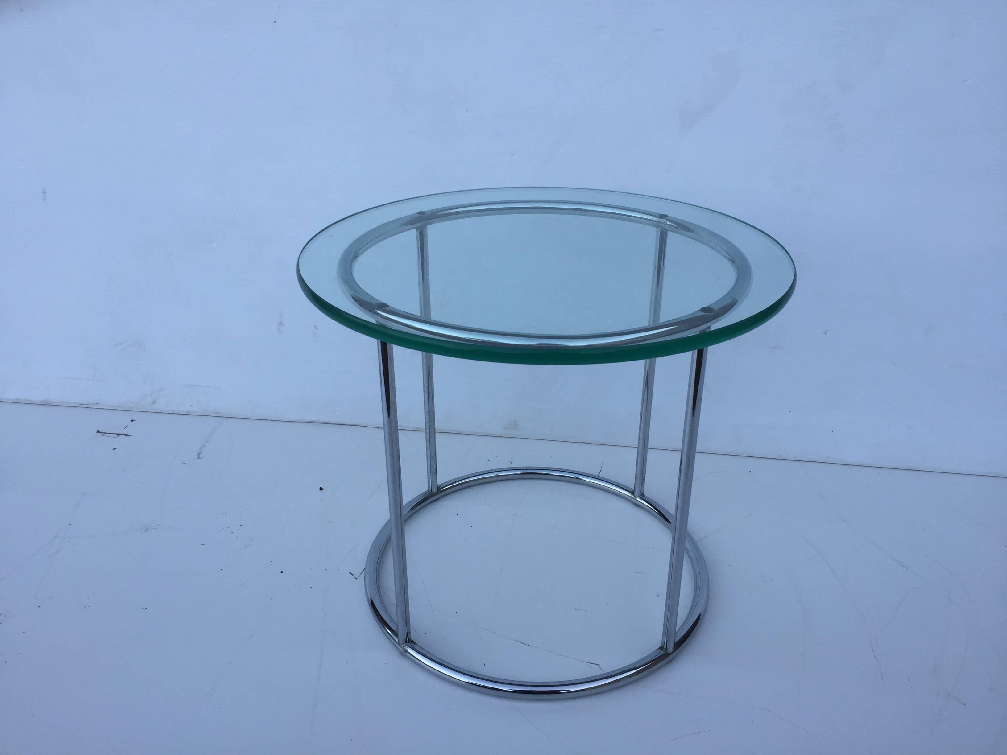 American Pair of Petit Nickel Round End Tables For Sale