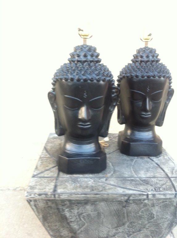 Pair of large very dramatic Buddha lamps in black attributed to James Mont.  This item is on sale for a clearance price.