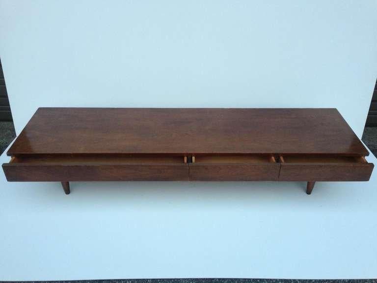 Very low console cabinet in the style of John Widdicomb. 1955 Dania Collection by American of Martinsville. 