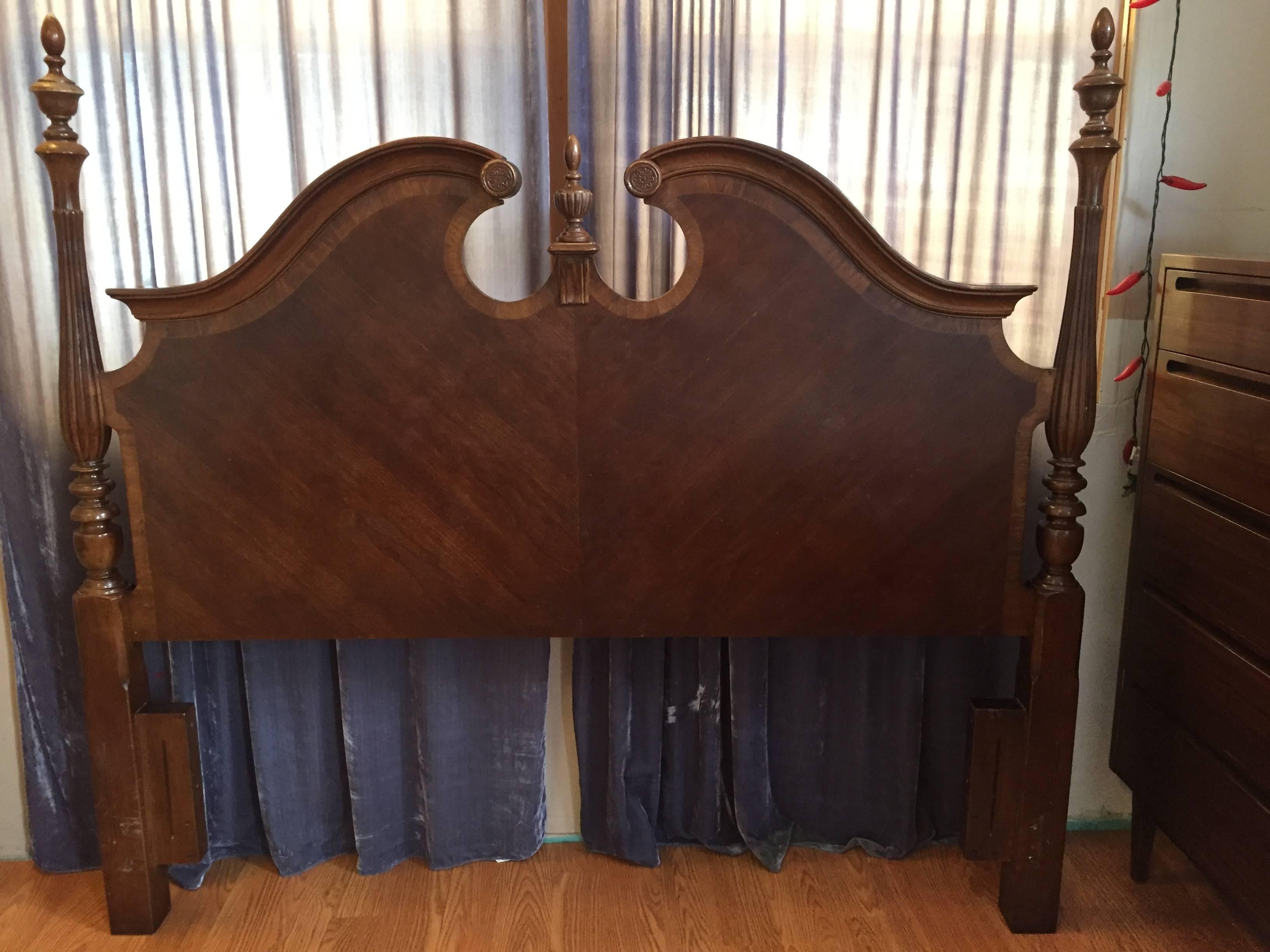 Queen-size bed head board with dual fluted posts and triple finials.