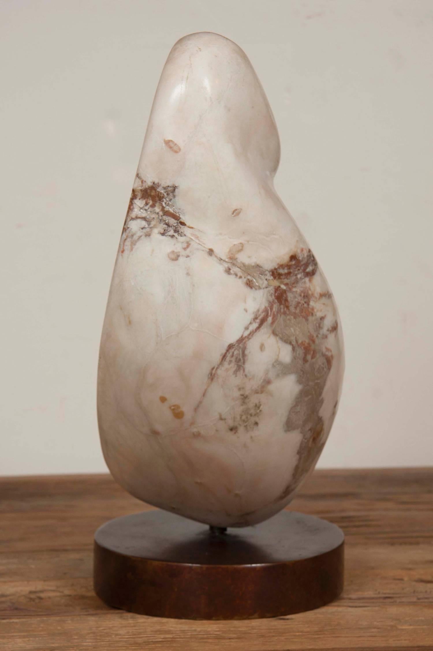A marble sculpture by Ann Harris, Canadian.
Untitled.
Born 1928.
Signed on base.

Collections: La Citadelle, Quebec; Official Residence of the Prime Minister, 24 Sussex Drive, Ottawa; Albright-Knox Art Gallery, Buffalo, NY; among others.