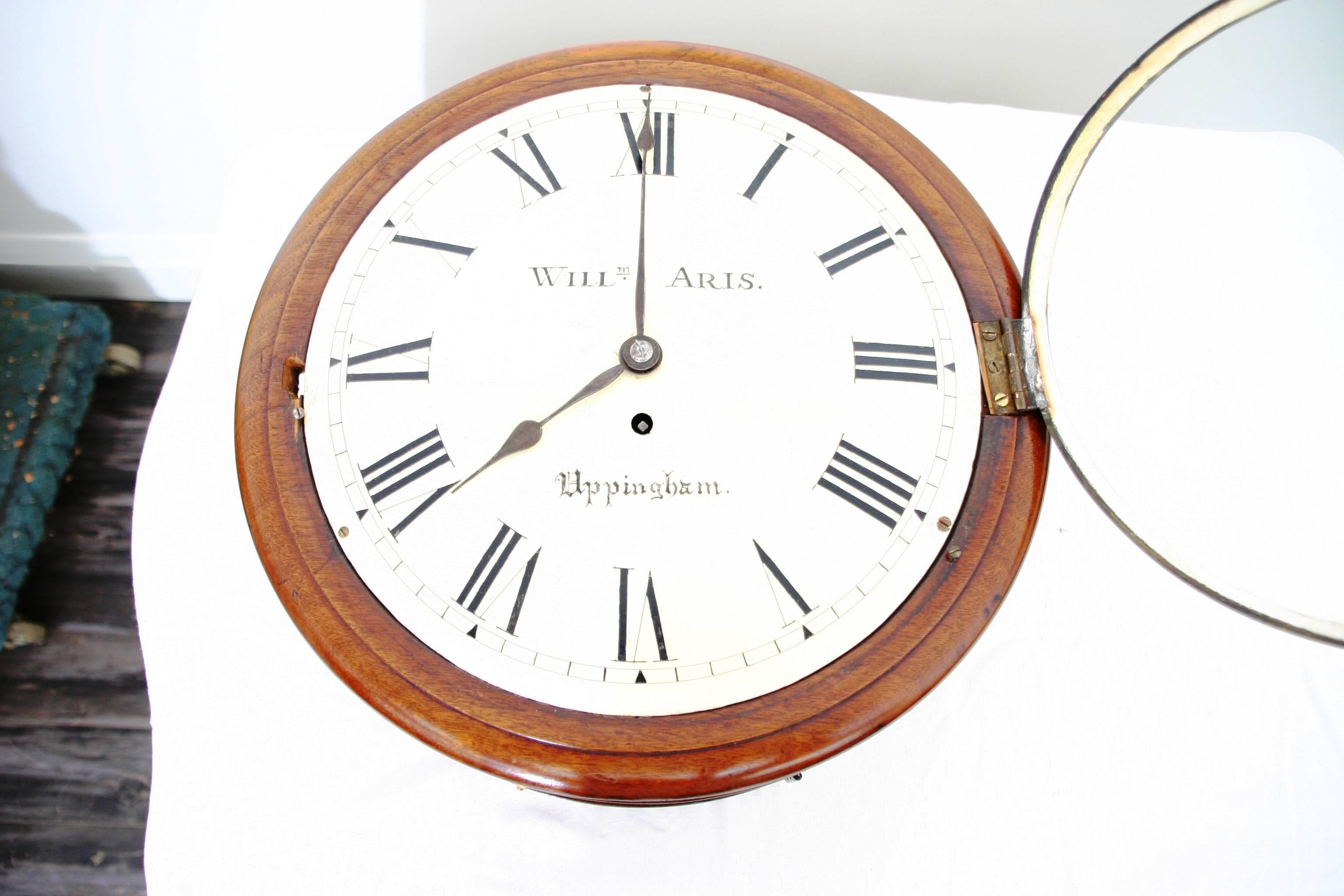 Signed 19th century English wall clock
A very good quality mahogany round 12 inch painted dish dial wall clock with single fusee movement and anchor escapement.