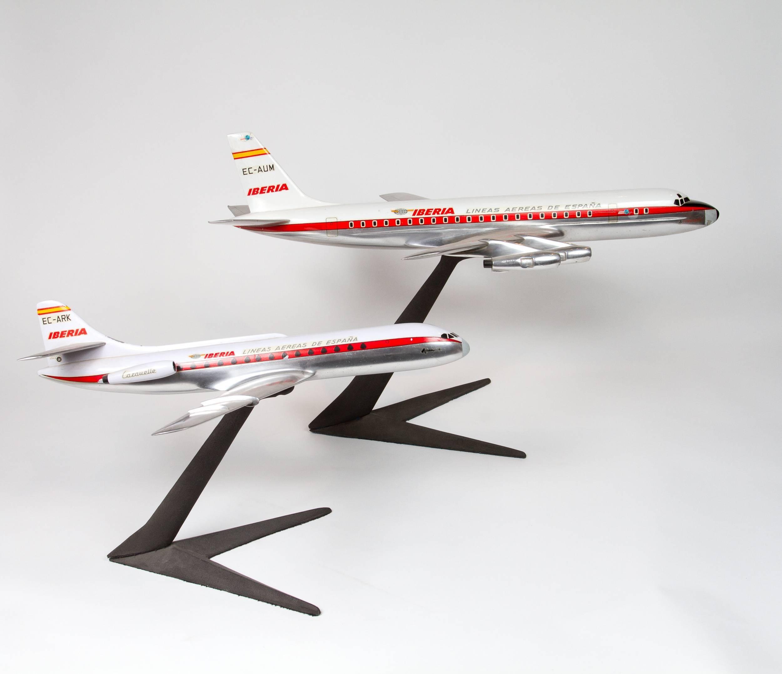 Pair of unmatched of solid aluminium Iberia Airplane Models DC-8 and SE-210 Model:
dimensions of the smallest is H 14, W 19, D 19 in.

 