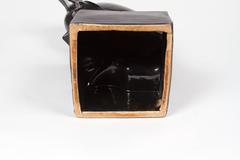 Sculpture en céramique de Robert Hainard : un corbeau noir fantaisiste