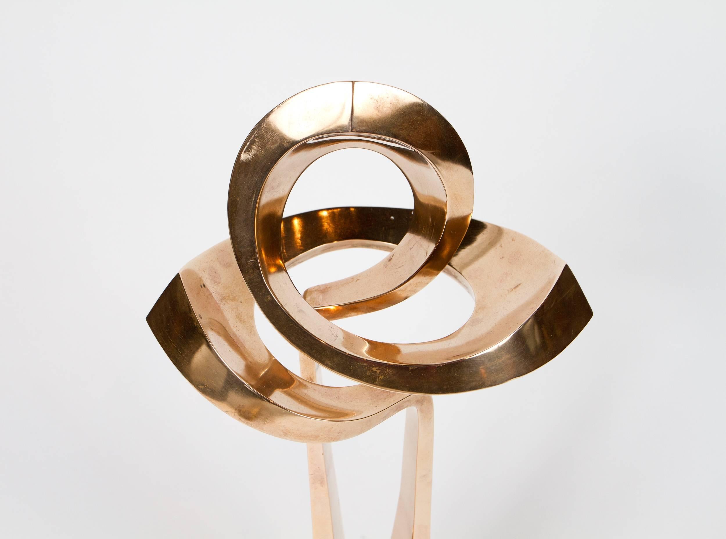 Elegant and stylish Modernist polished brass sculpture by Robert J. Mitchell (b.1930). Signed: R J Mitchell 1/10.