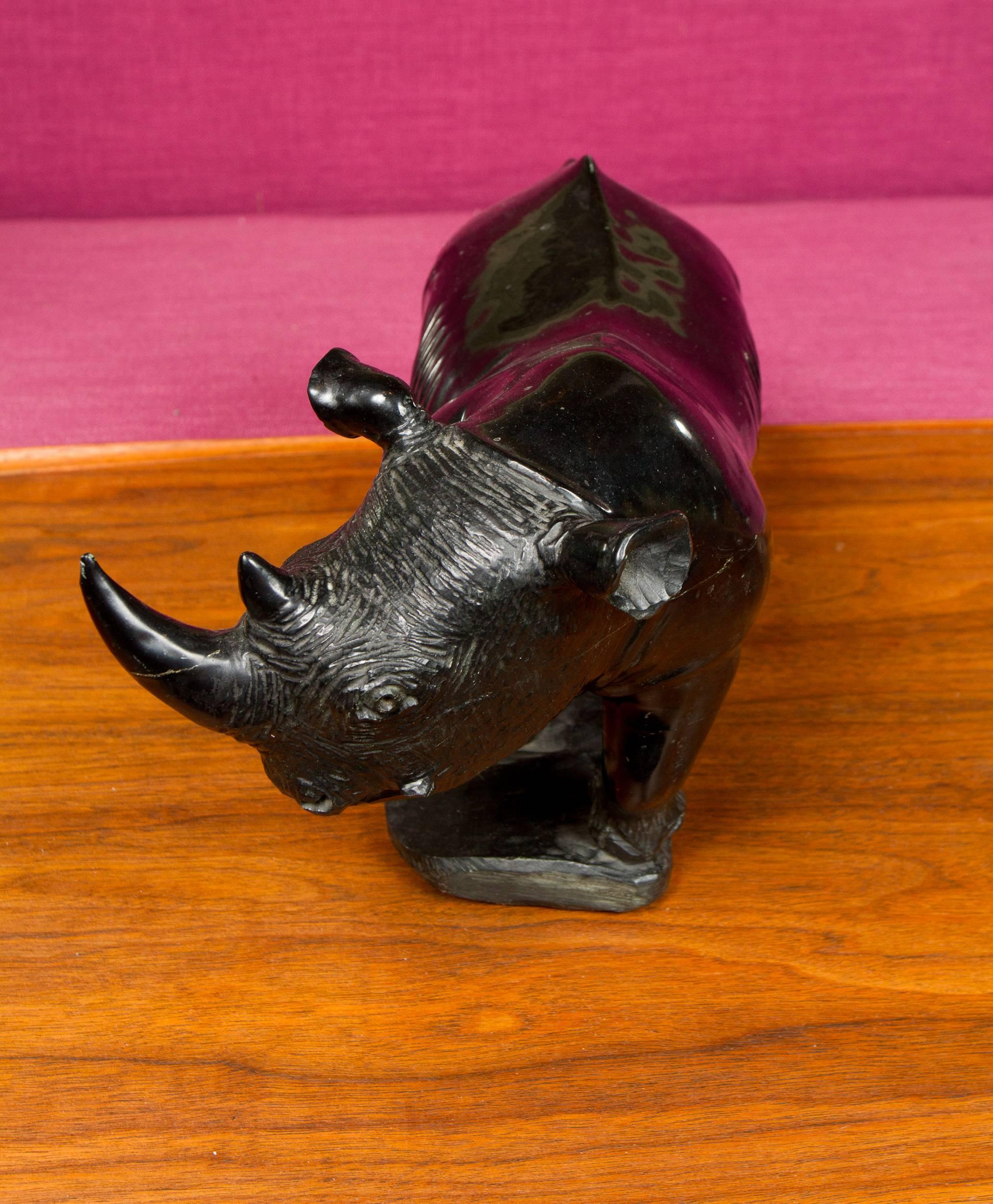 Zimbabwean Black Stone Carved Rhino Sculpture For Sale