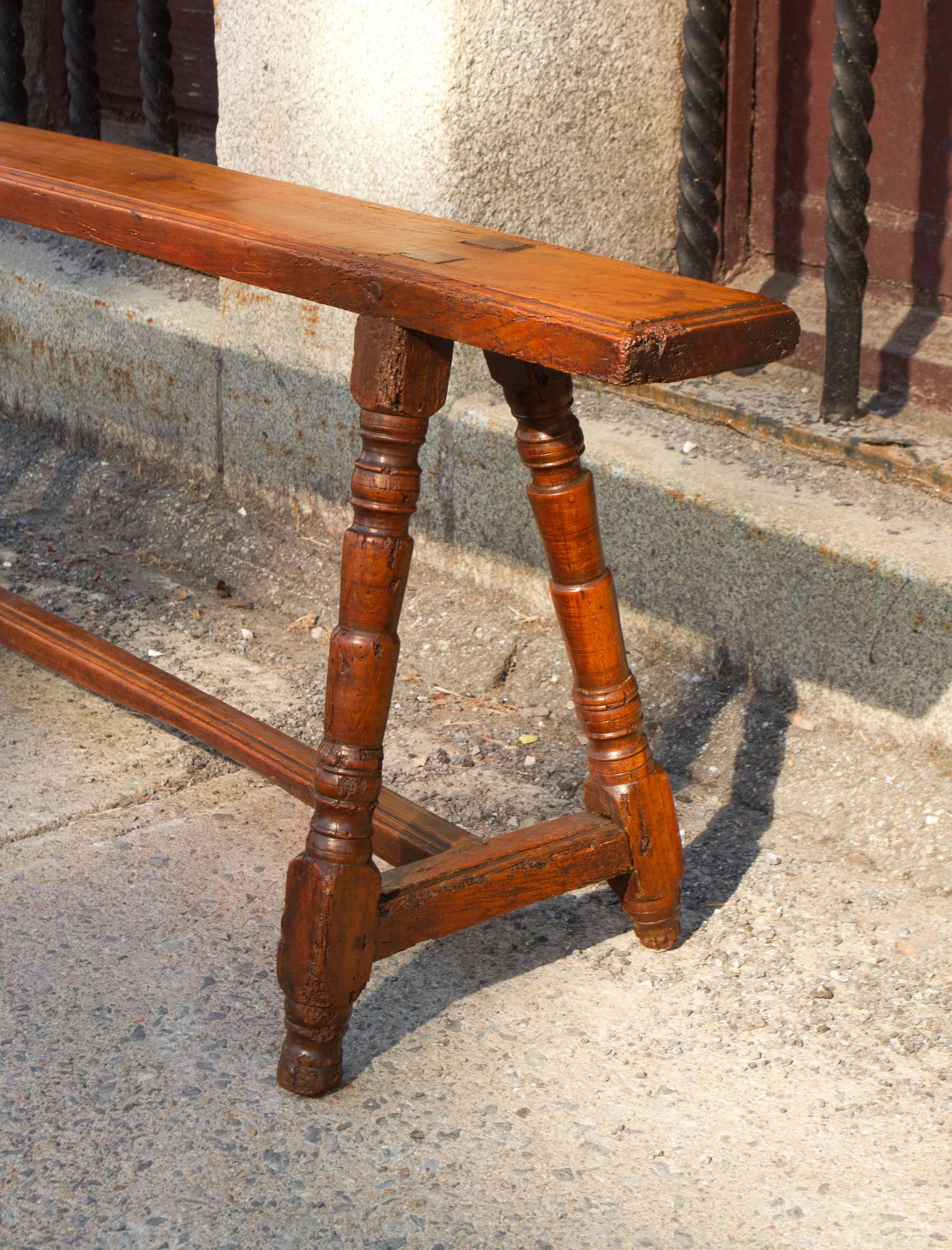 Pair of late 17th century French beechwood long benches. Provenance: Frederick Cleveland Estate Morgan le Sabot Senneville. Bought at le Bon Marché Paris, 1929.