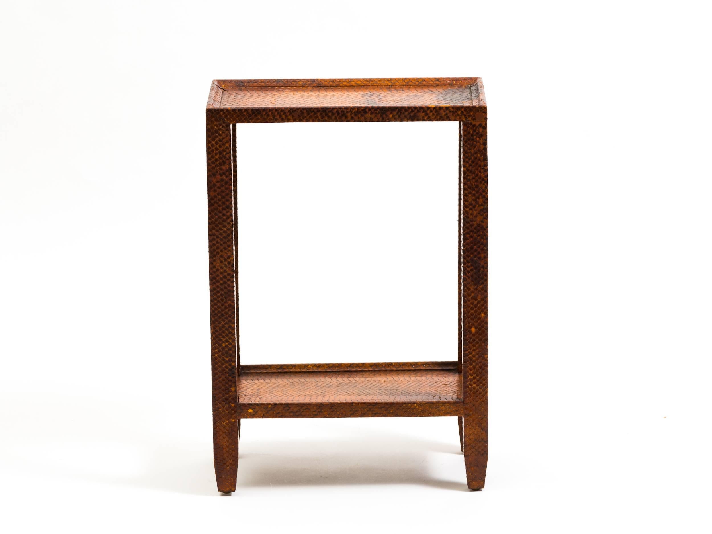 Snake skin-covered  side  able, attributed to Karl Springer. Provenance: collection of Vincent Petragnani. Senior designer  of Ethan Allen.