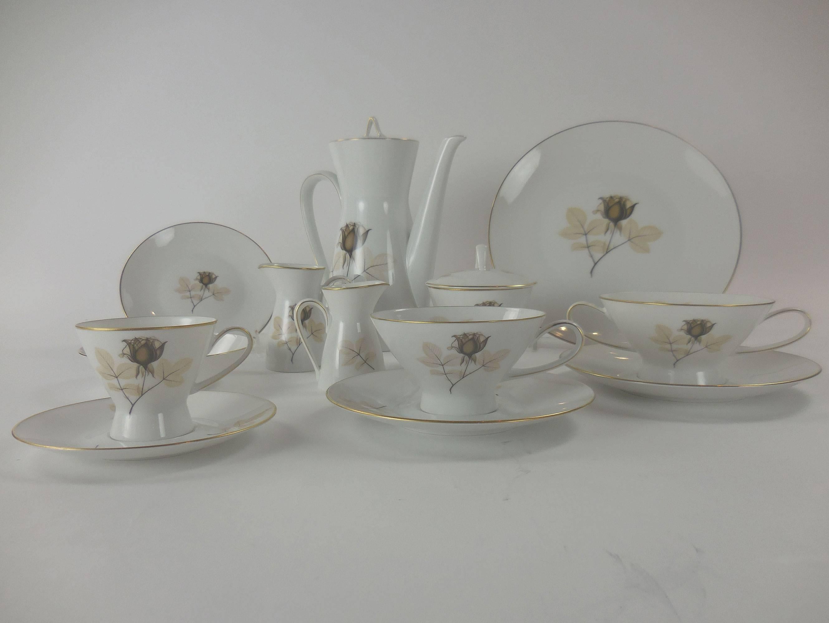 Rosenthal Modernist porcelain dinner service in the desirable Form 2000 design launched by Raymond Loewy in Shadow Rose pattern (1953-1989). The service comprises coffee pot with lid, one sugar bowl and lid (4.5 inches h.), two creamers, eight