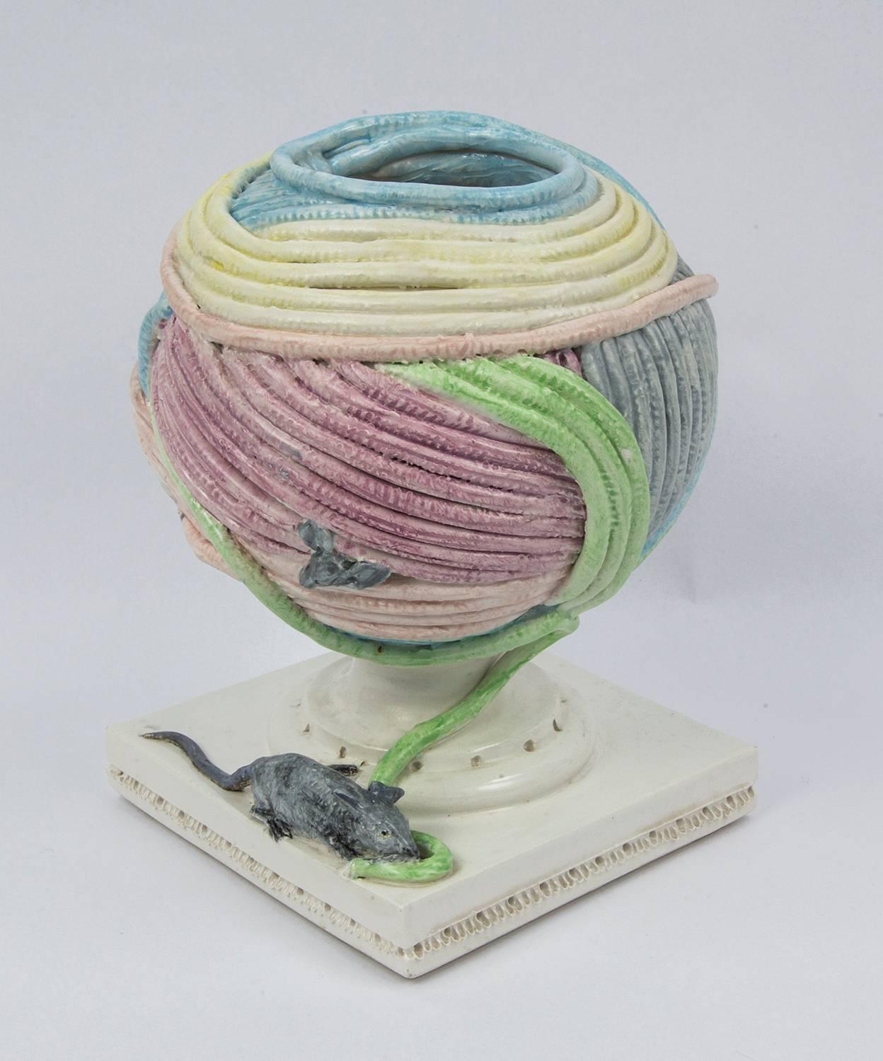 Fabulous sculptural art pottery by famed artist Andrea Spadini. Depicting playful cats, mice and skeins of yarn vase figures, signed on base: Spadini. Fun and funky!
The table setting or surtout-de-table consists of six Siamese cat figures with six